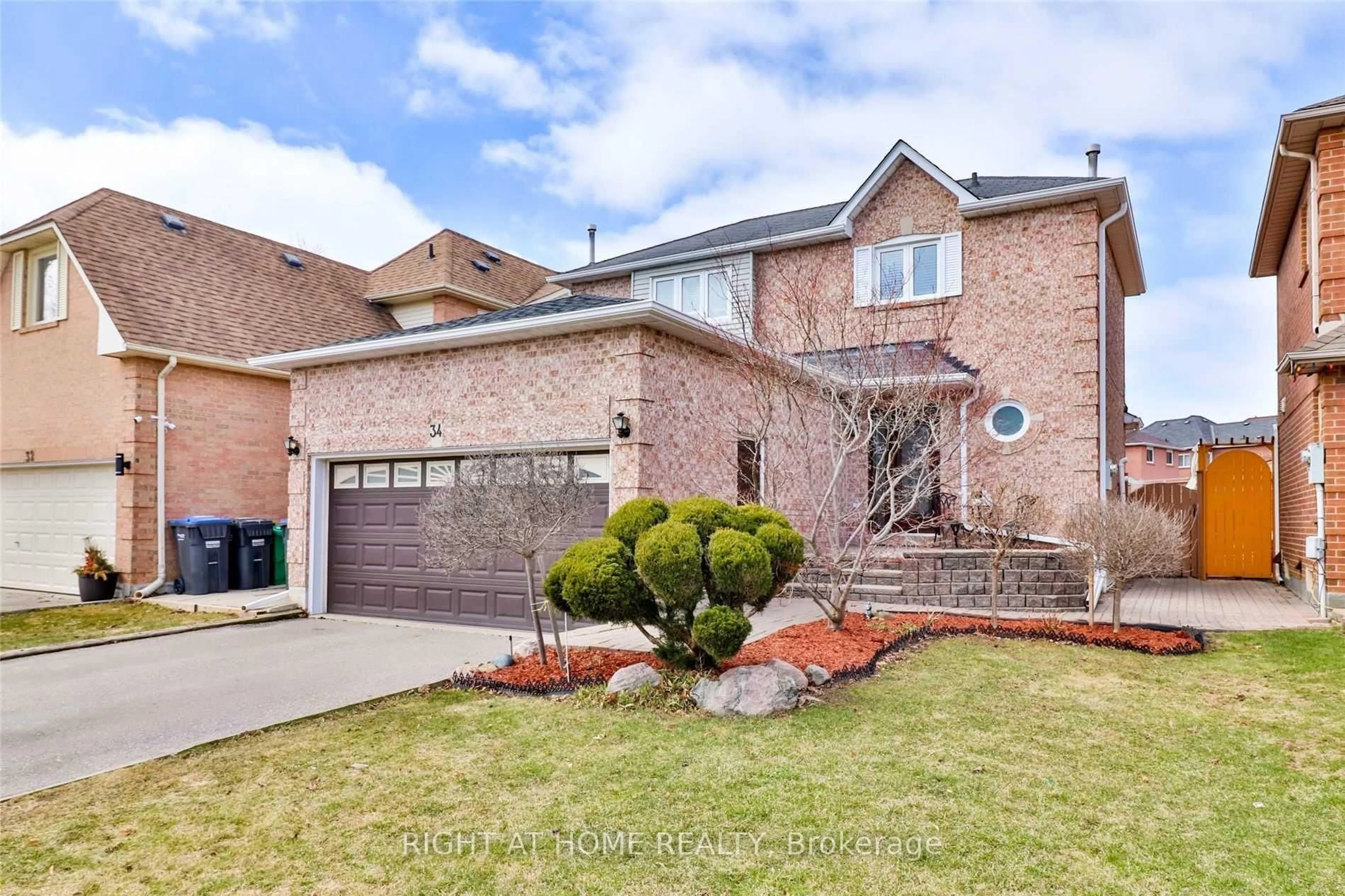 Home with brick exterior material, street for 34 Drinkwater Rd, Brampton Ontario L6Y 4T5
