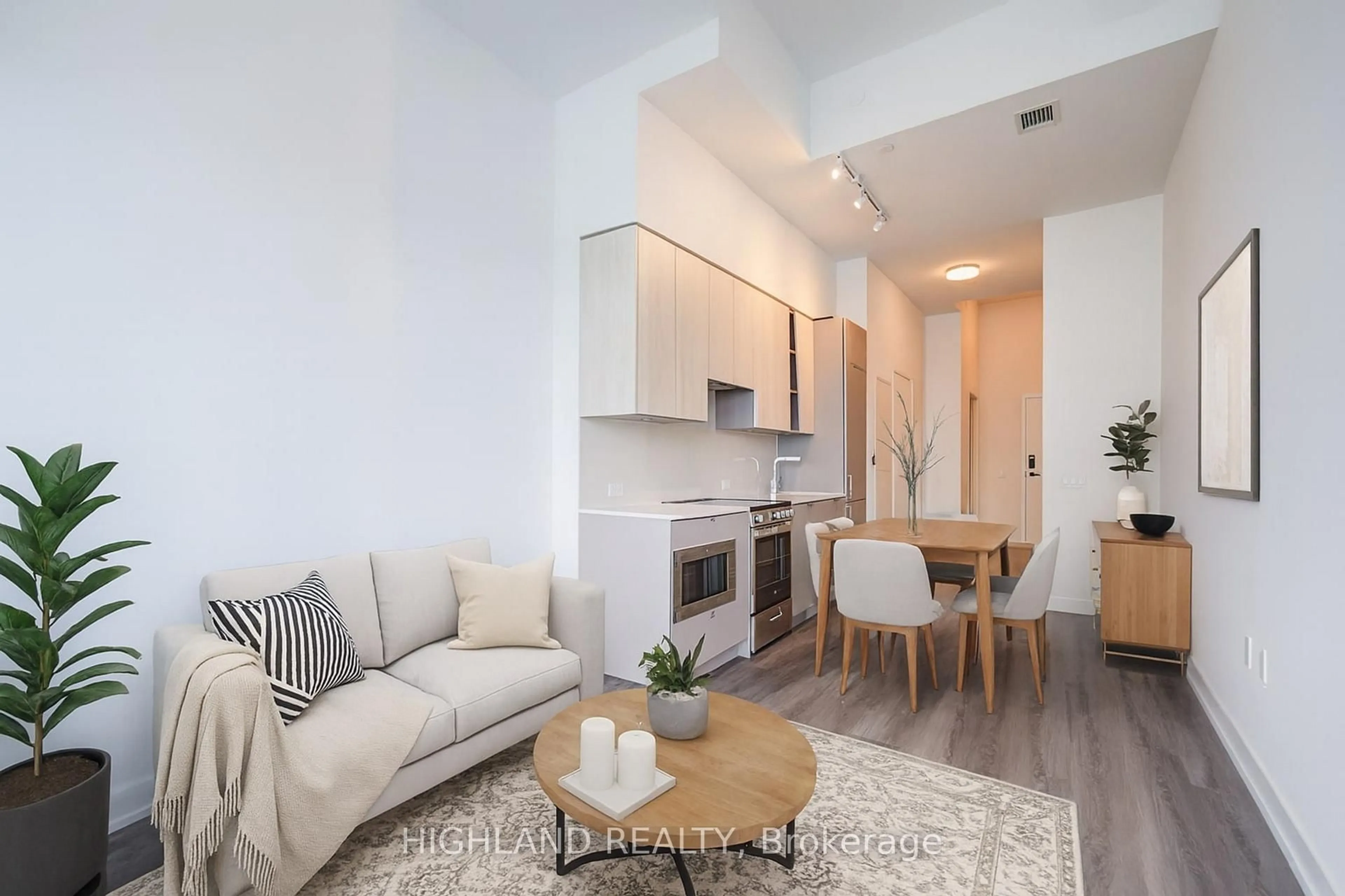 Living room with furniture, wood/laminate floor for 3883 Quartz Rd #603, Mississauga Ontario L5B 0M4