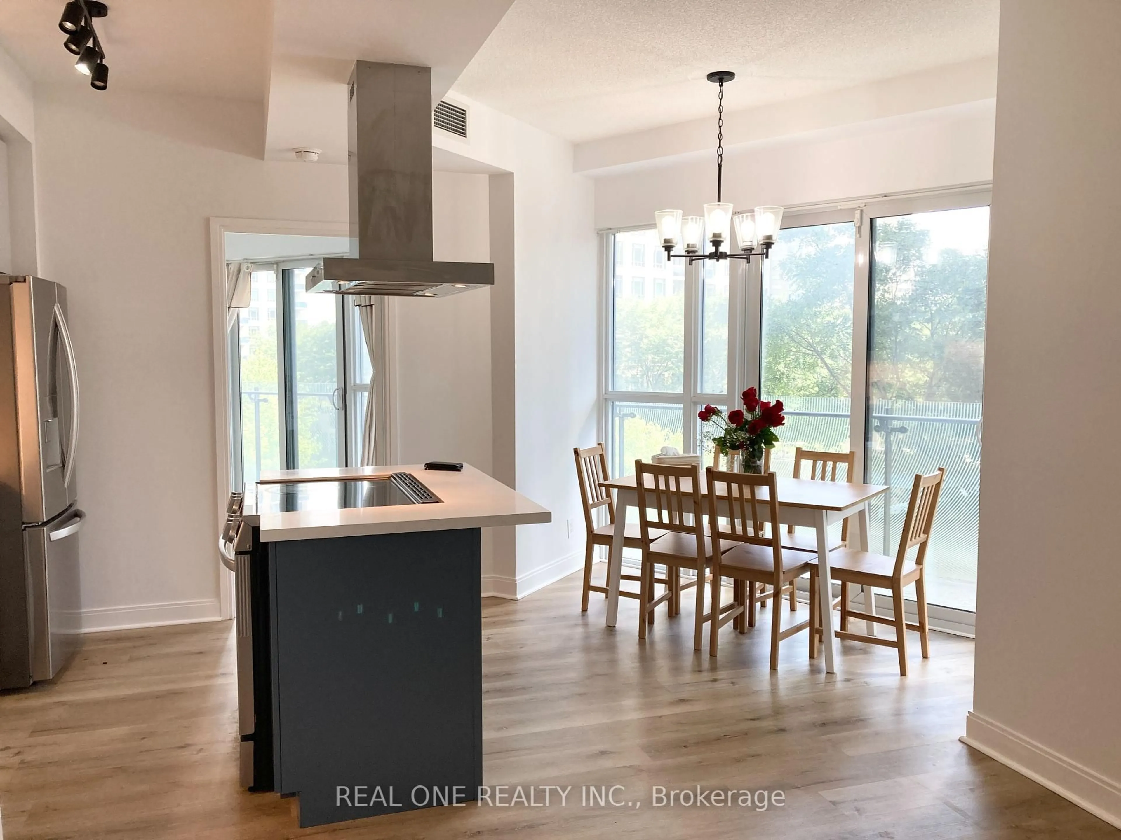 Open concept kitchen, wood/laminate floor for 50 Absolute Ave #405, Mississauga Ontario L4Z 0A8