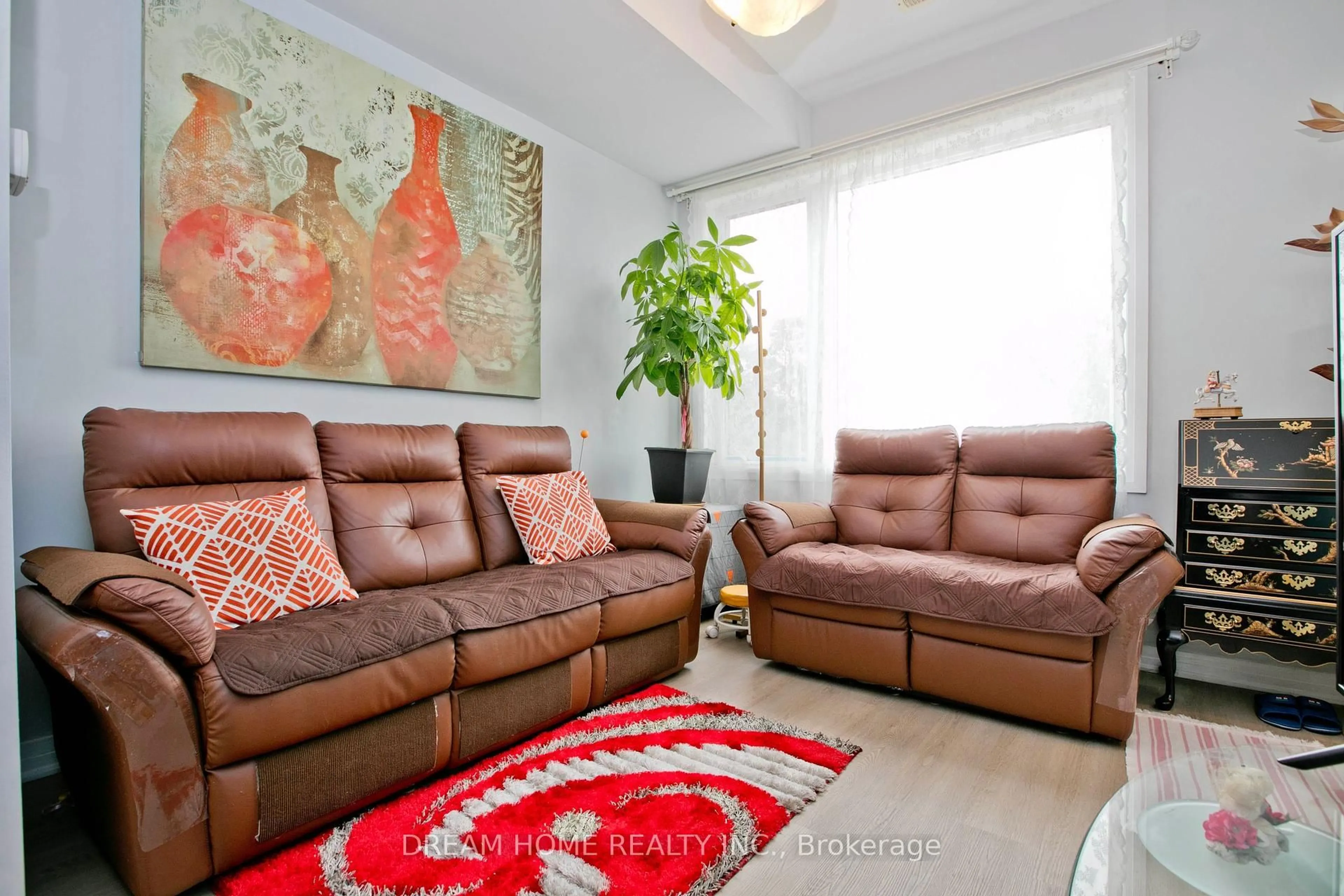 Living room with furniture, carpet floor for 120 Frederick Tisdale Dr #U 4, Toronto Ontario M3K 0A8
