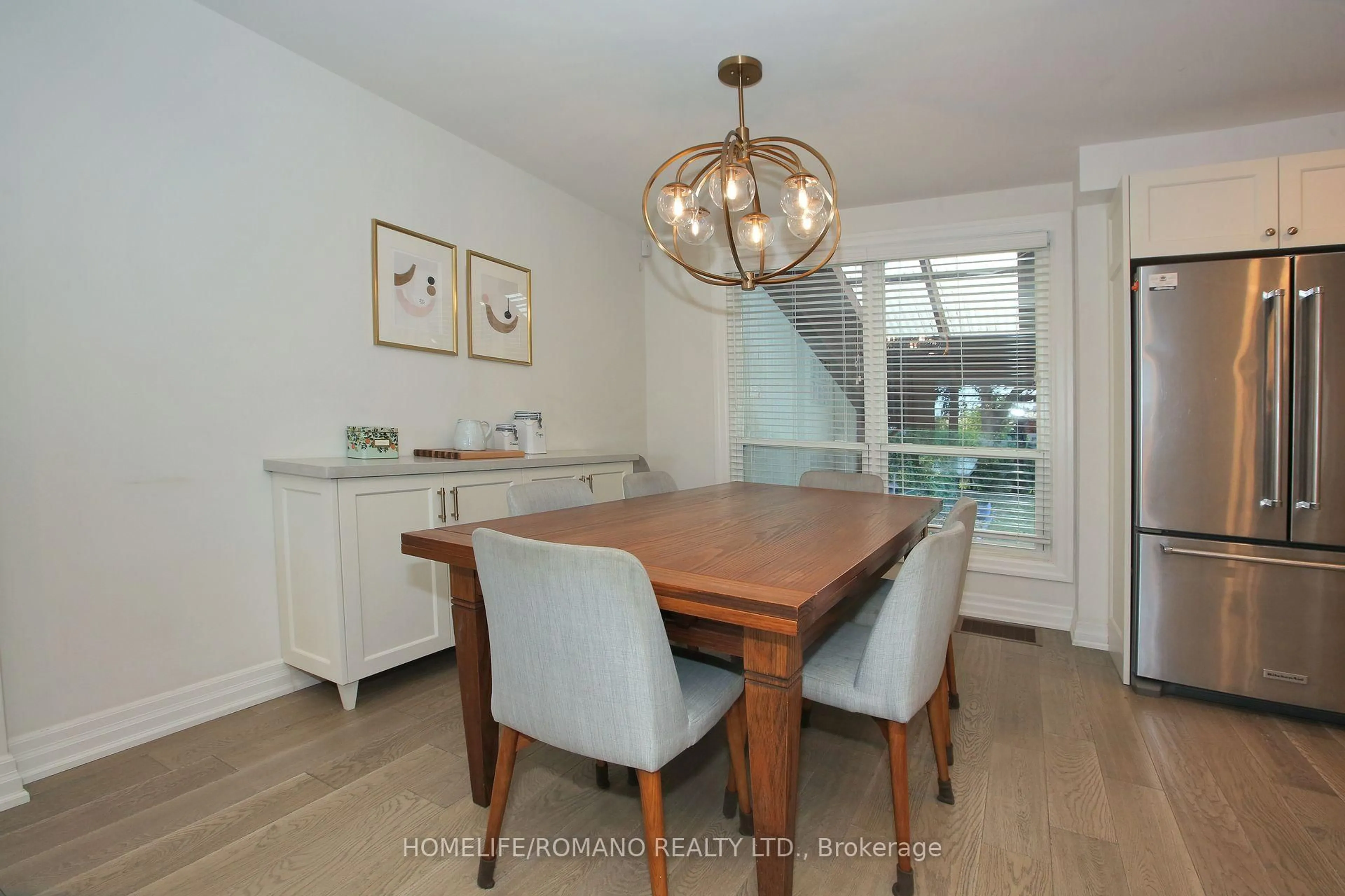 Dining room, wood/laminate floor for 72 Deverell Cres, Toronto Ontario M3K 1C8