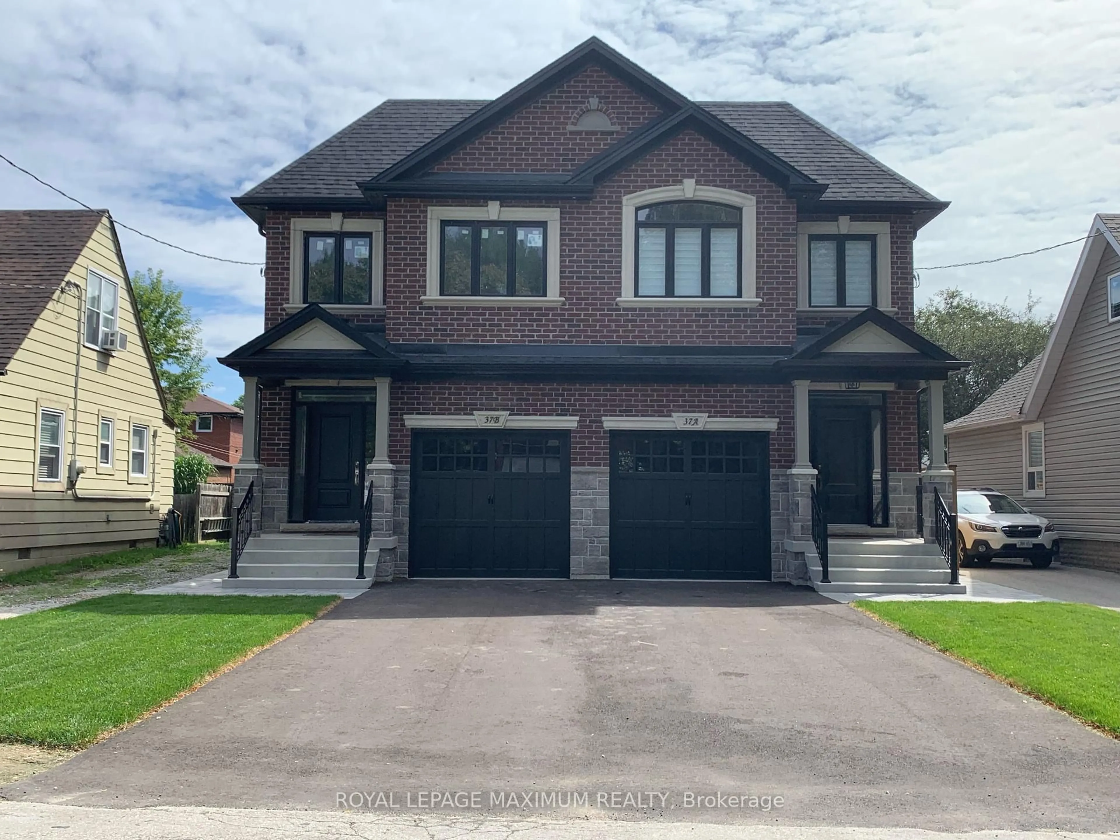 Home with brick exterior material, street for 39 B Gort Ave, Toronto Ontario M8W 3Y7