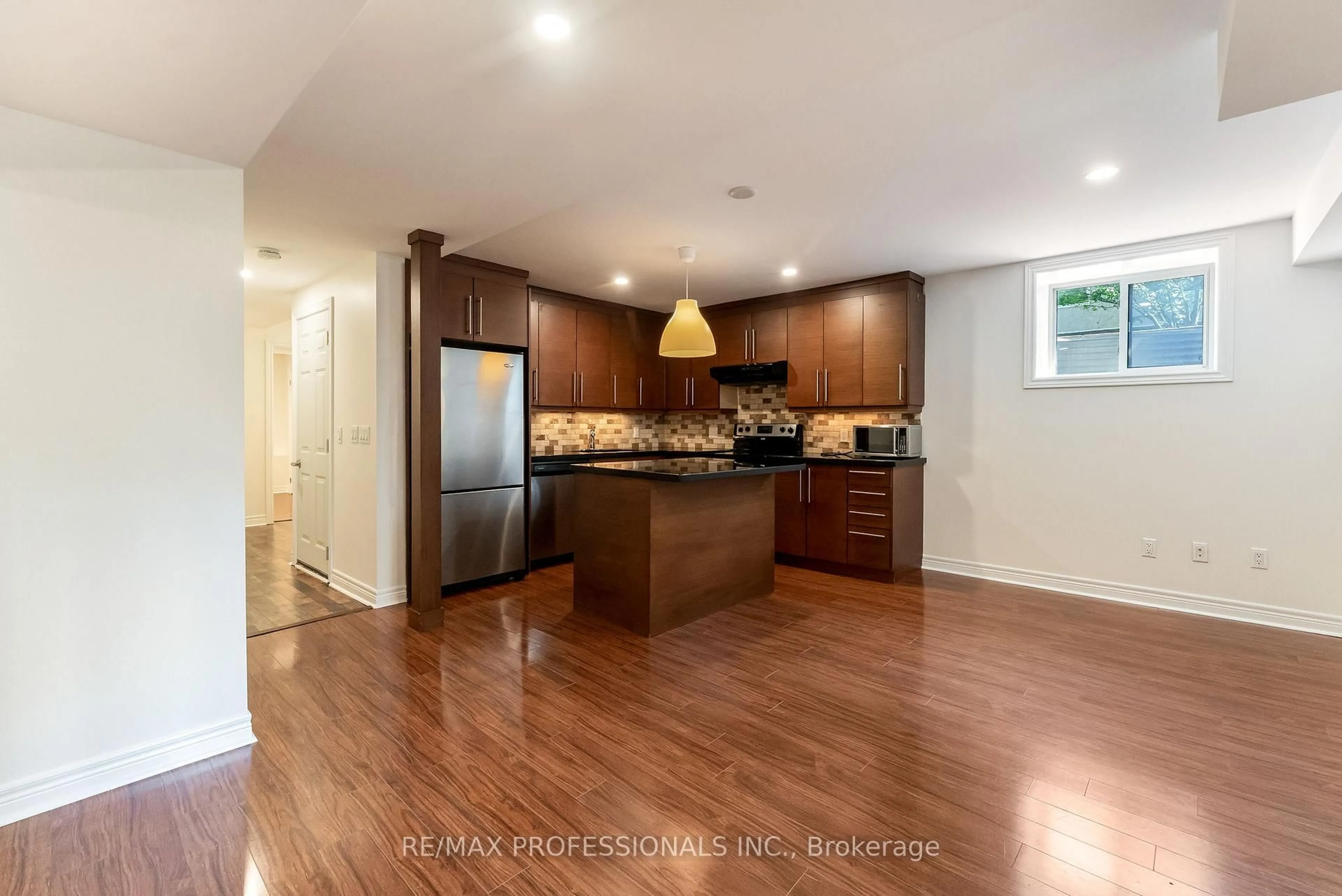 Open concept kitchen, unknown for 34 Monkton Ave, Toronto Ontario M8Z 4N2
