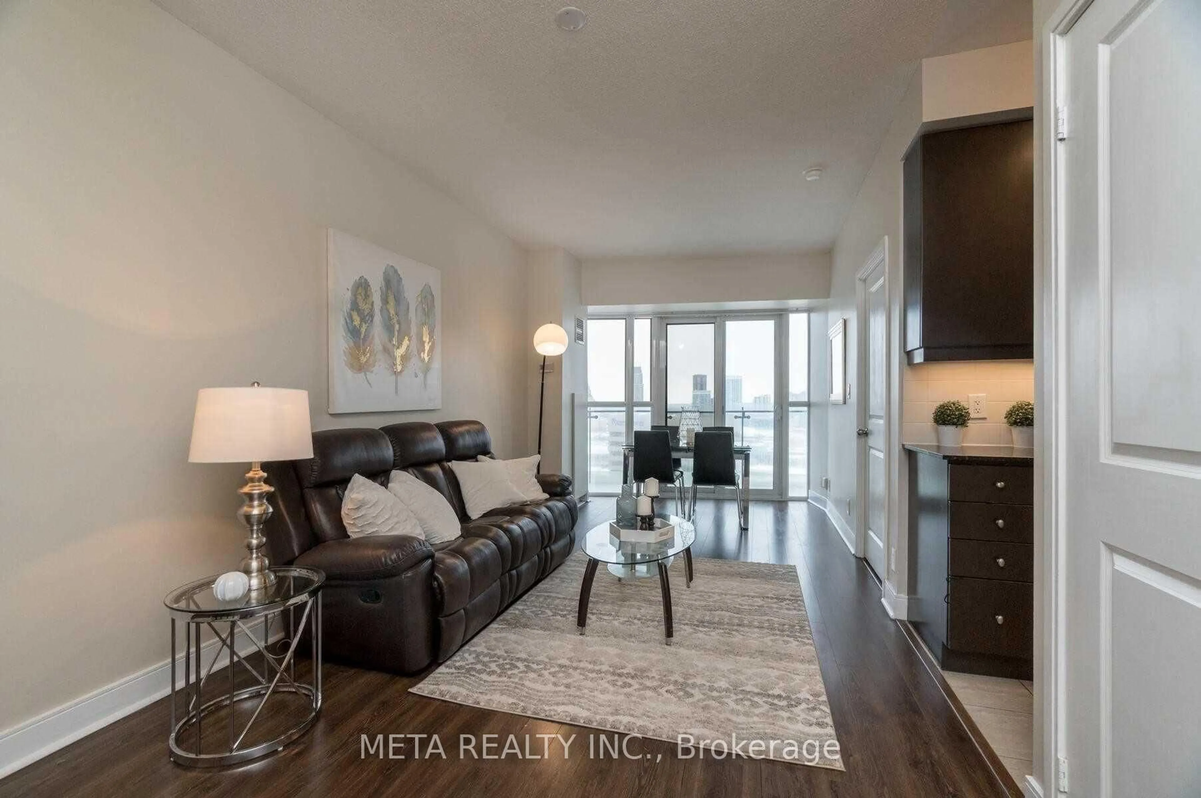 Living room with furniture, wood/laminate floor for 50 Absolute Ave #2106, Mississauga Ontario L4Z 0A8