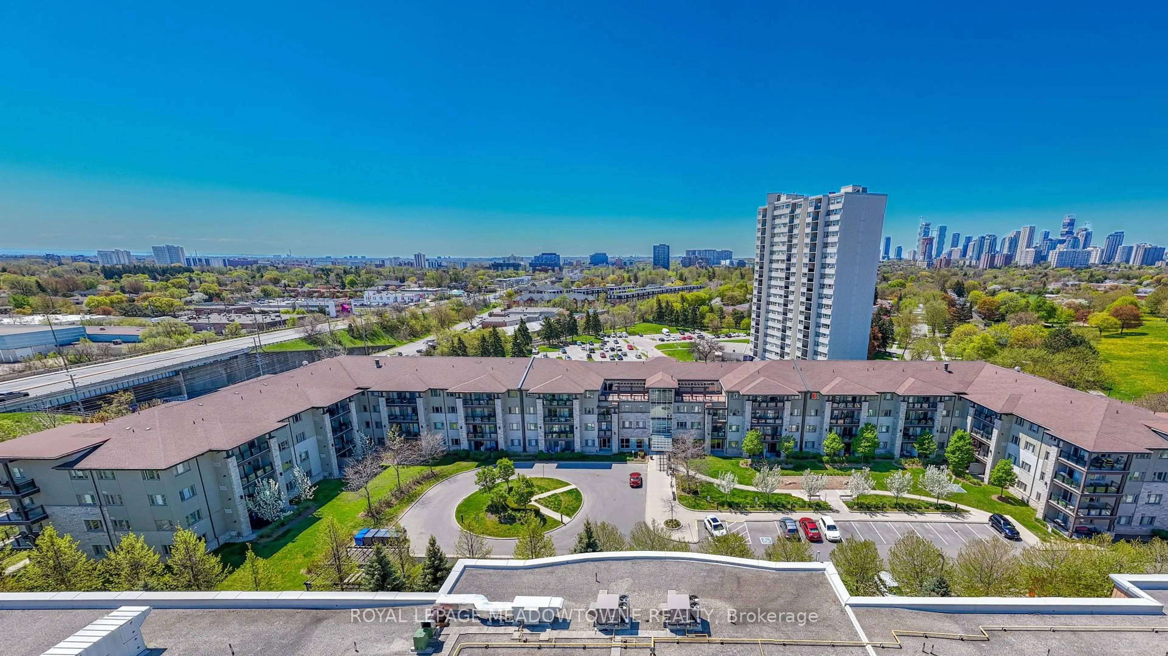 A pic from outside/outdoor area/front of a property/back of a property/a pic from drone, city buildings view from balcony for 570 Lolita Gdns #125, Mississauga Ontario L5A 0A1