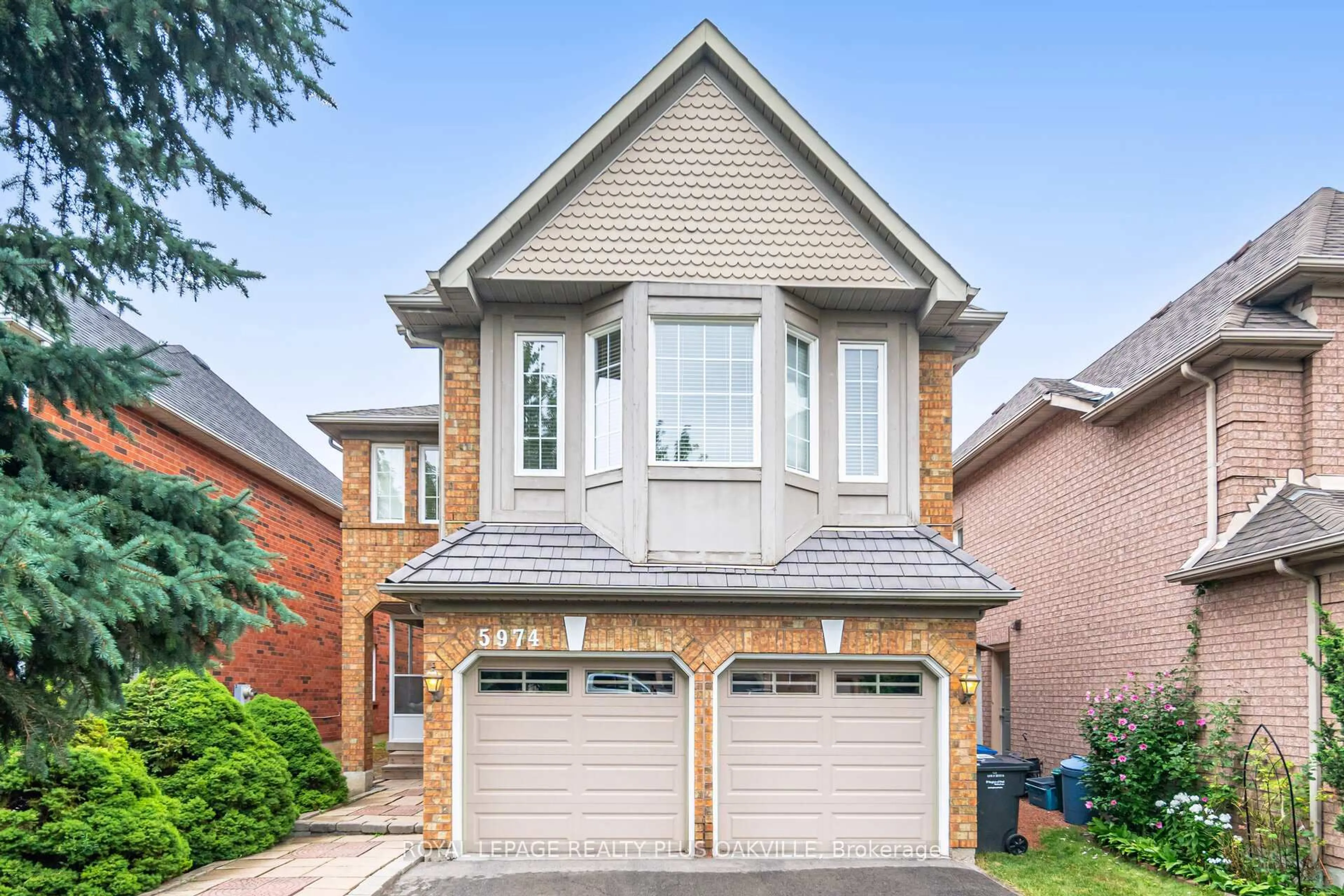 Home with brick exterior material, street for 5974 Tweed Crt, Mississauga Ontario L5M 5S6