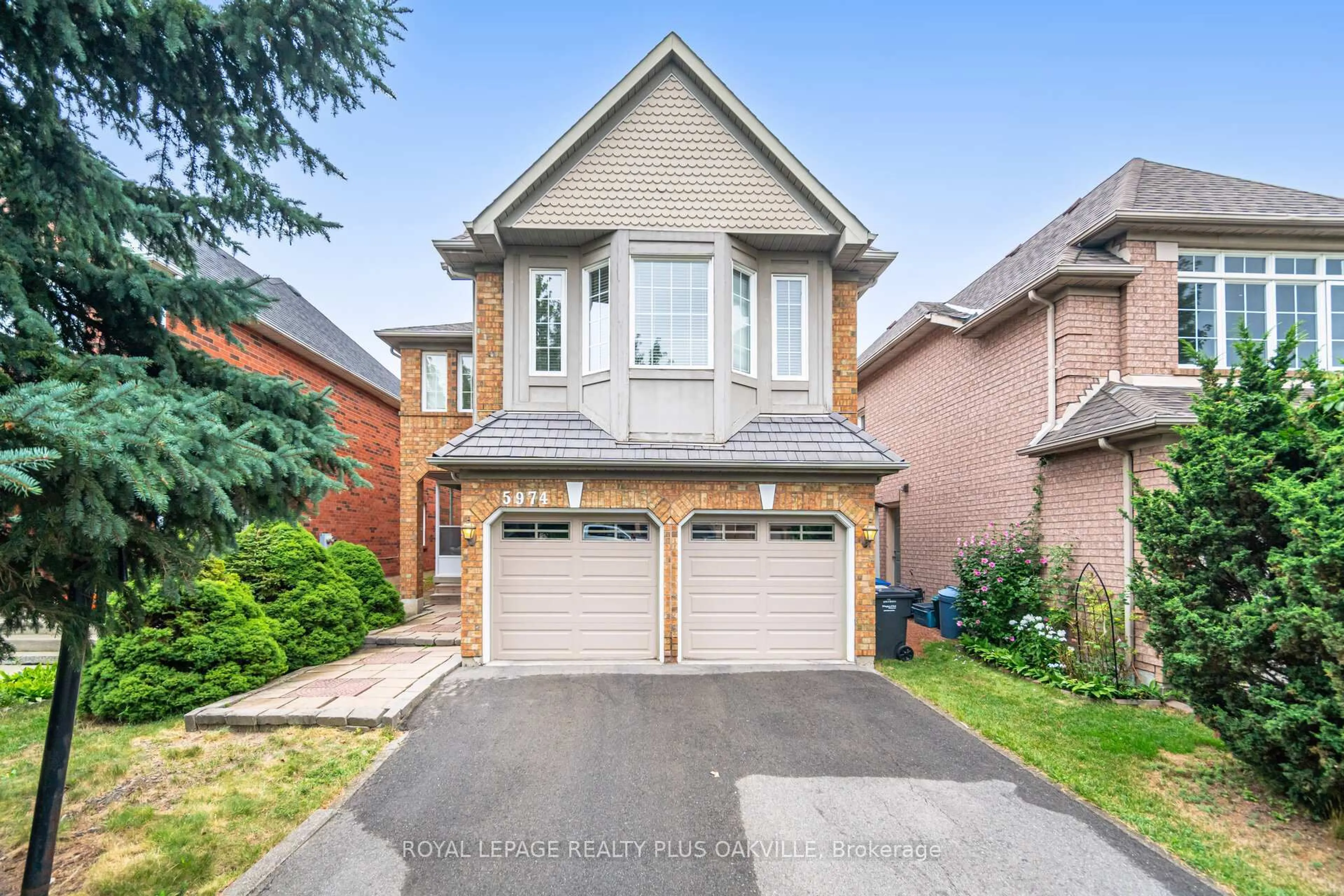 Home with brick exterior material, street for 5974 Tweed Crt, Mississauga Ontario L5M 5S6