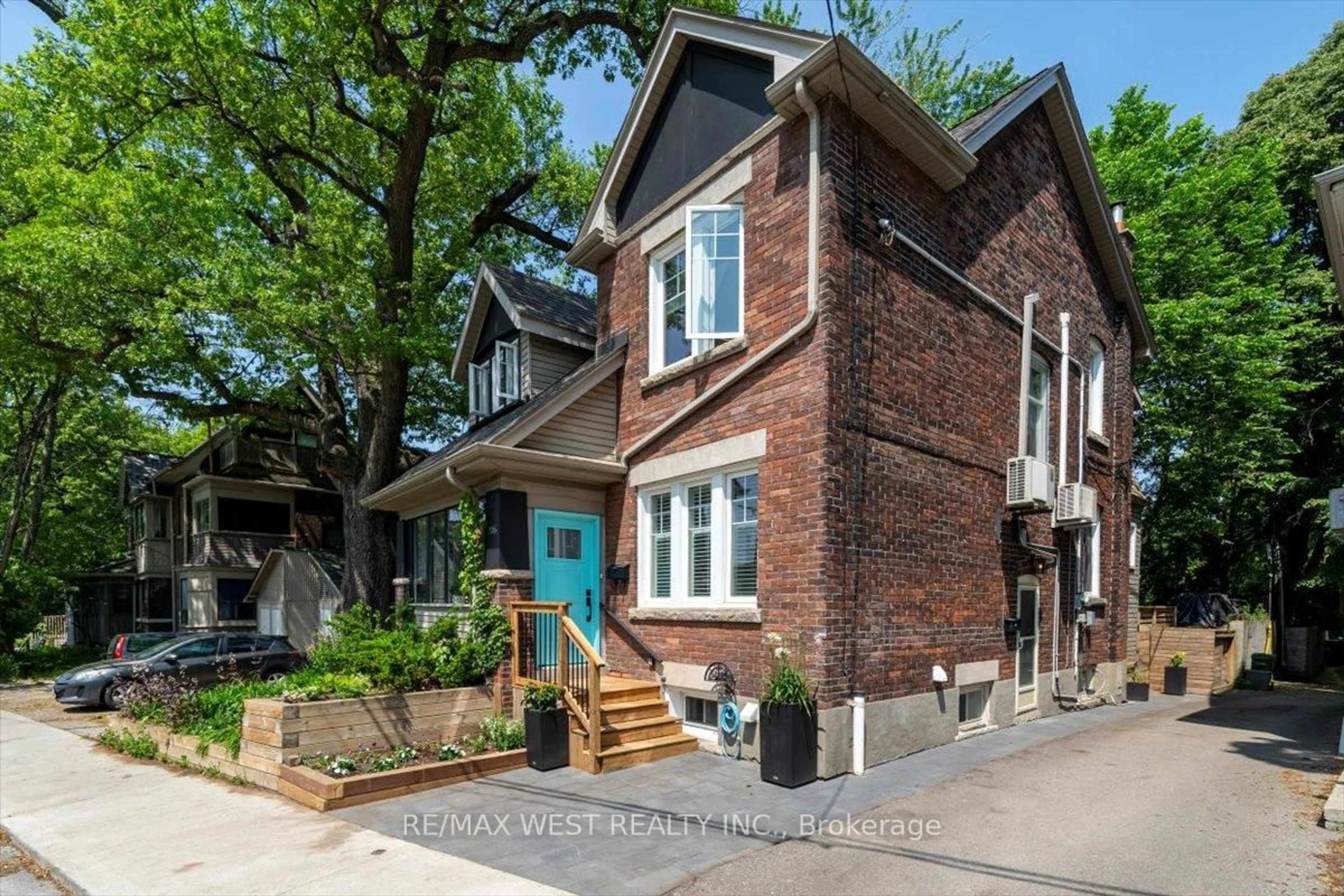 Home with brick exterior material, street for 206 Howard Park Ave, Toronto Ontario M6R 1W1