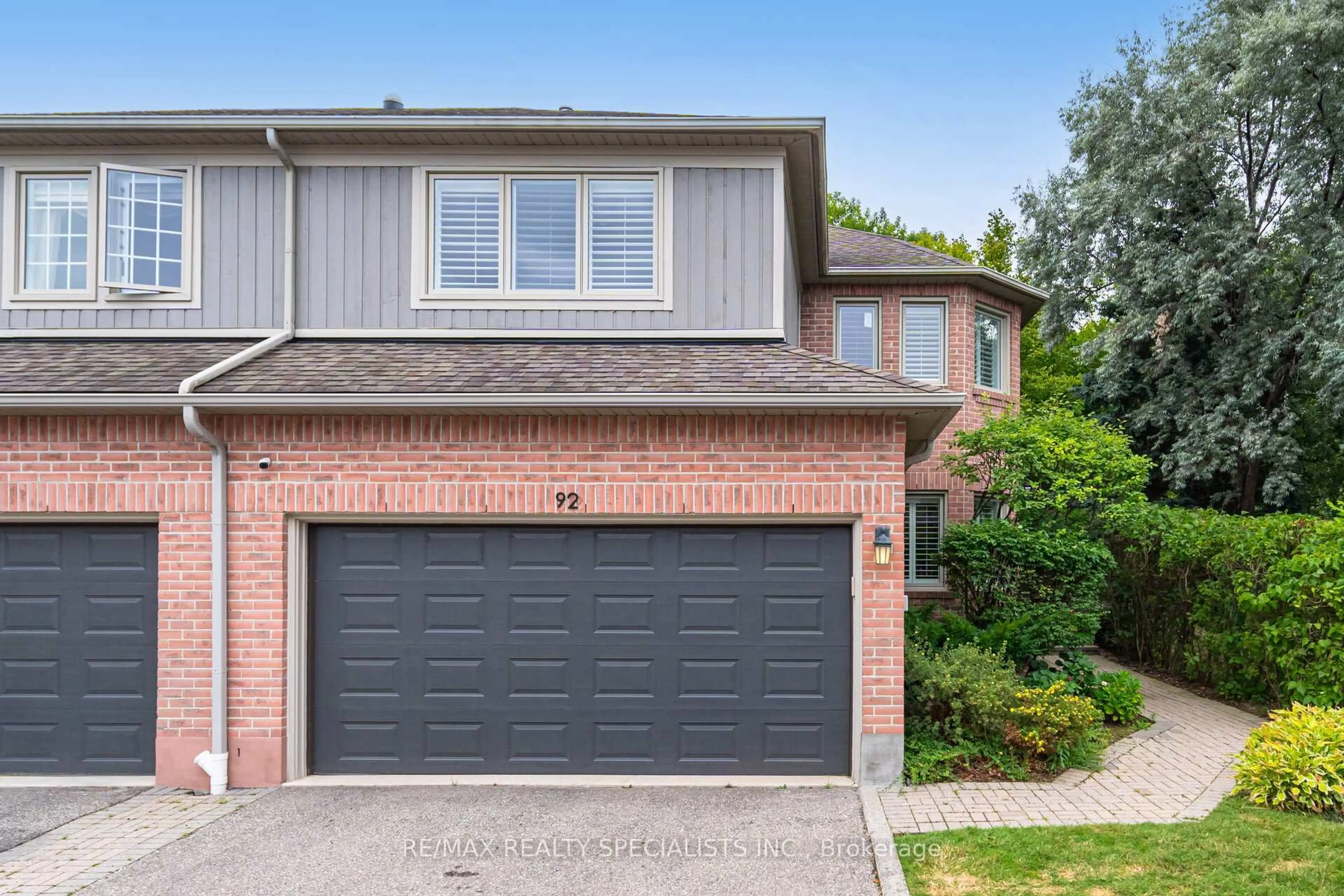 Home with brick exterior material, street for 5480 Glen Erin Dr #92, Mississauga Ontario L5M 5R3