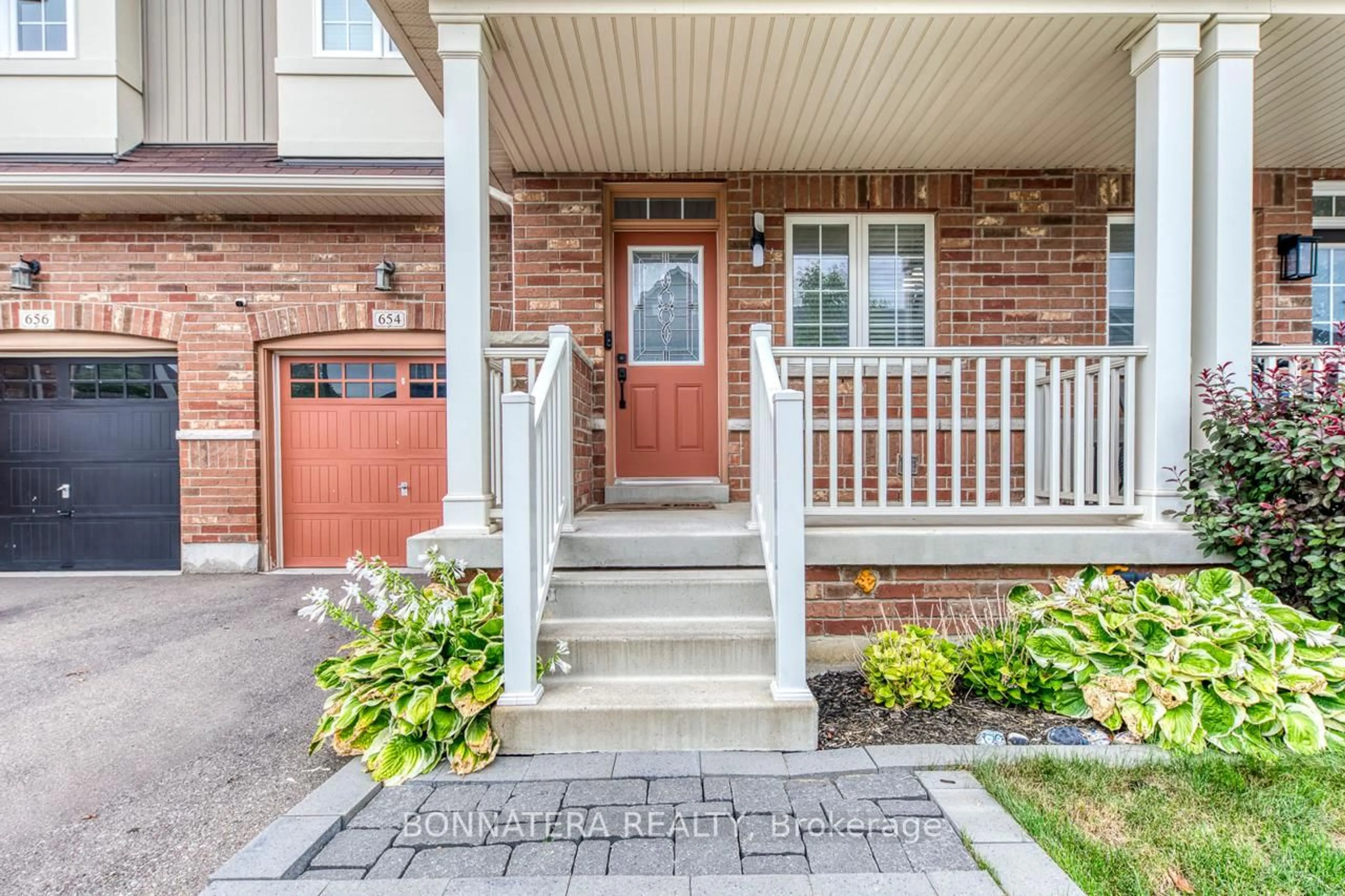Home with brick exterior material, street for 654 Murray Meadows Pl, Milton Ontario L9T 8L9