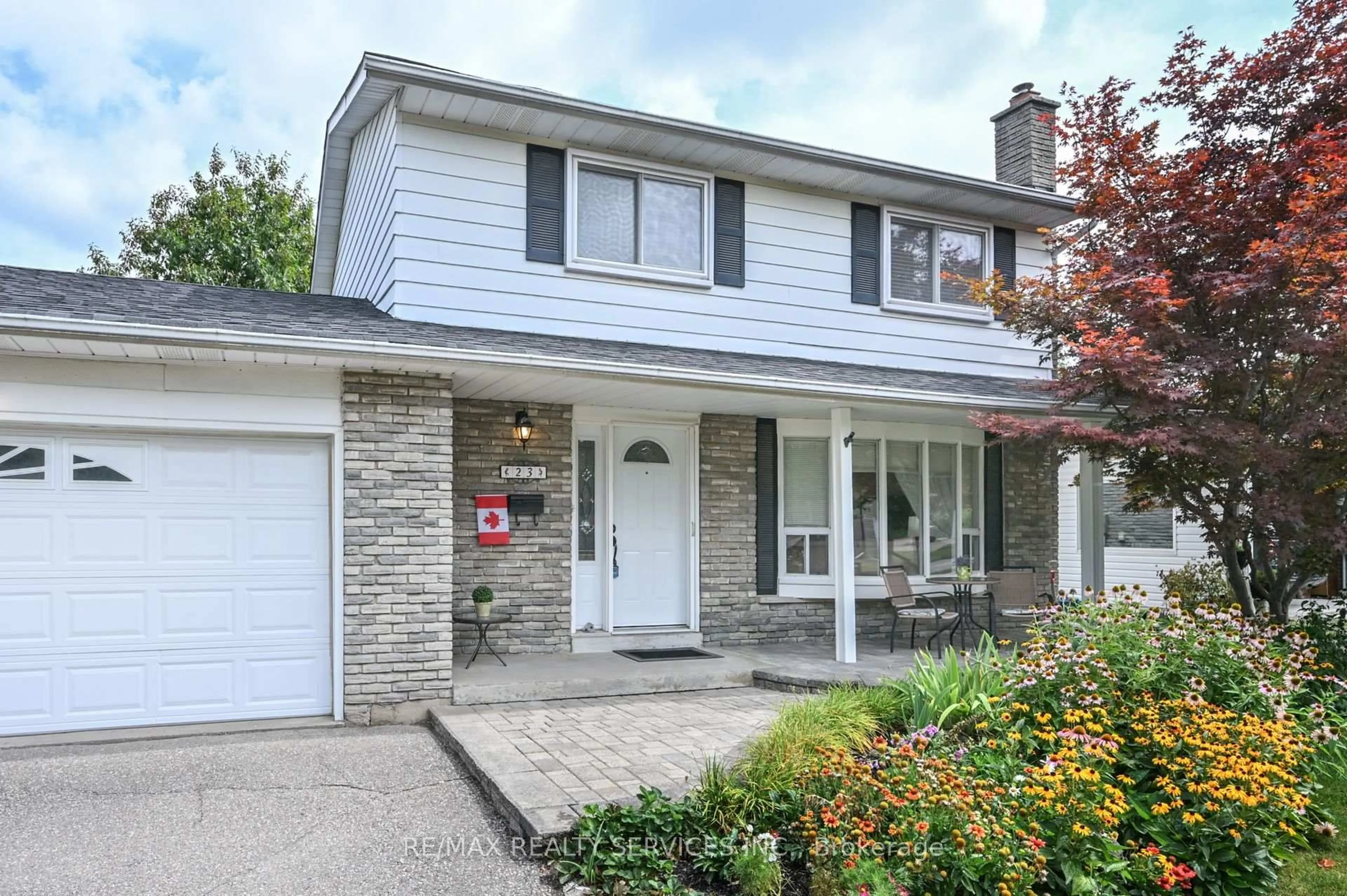 Home with vinyl exterior material, street for 23 Governor Grove Cres, Brampton Ontario L6Y 1A5