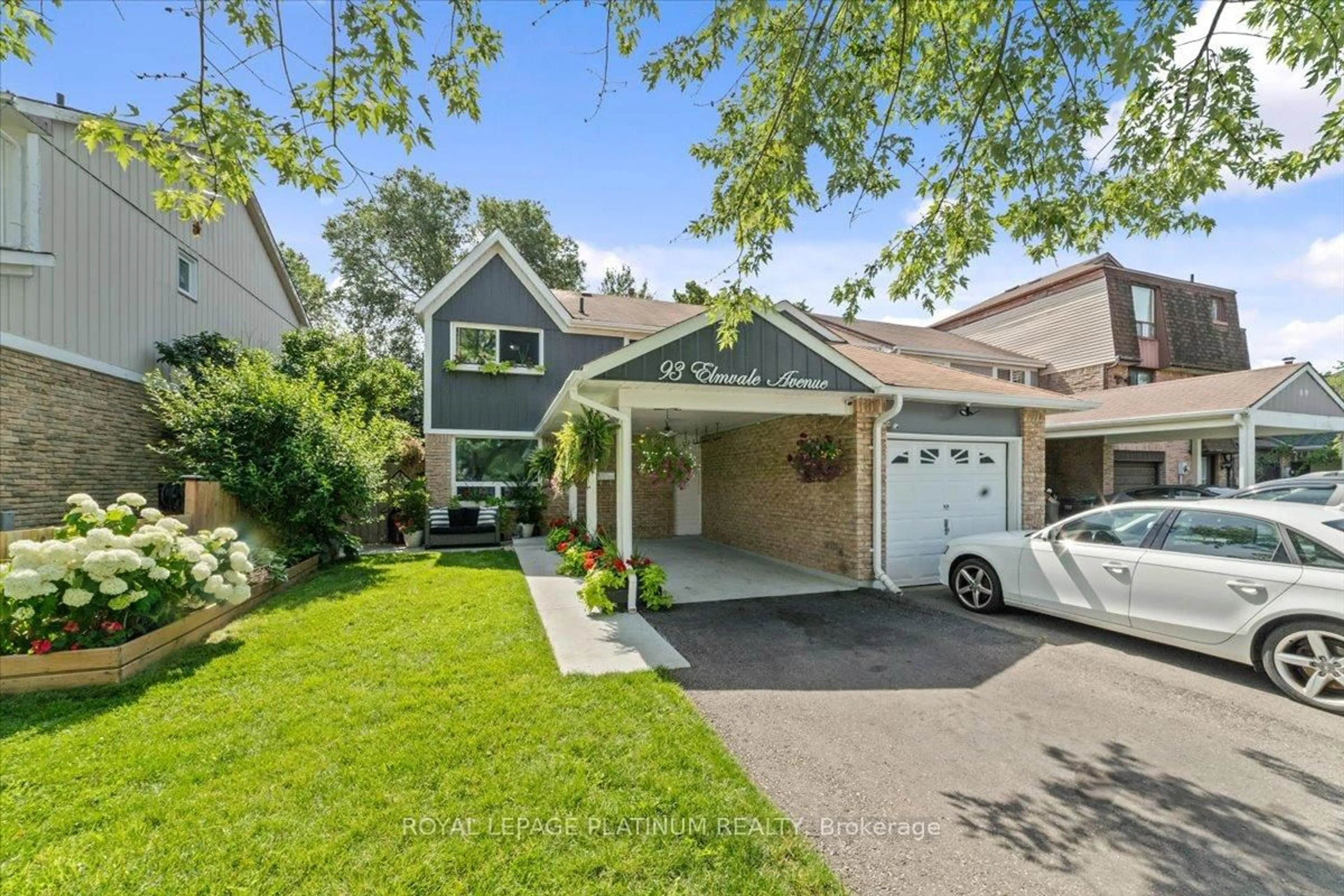 Home with vinyl exterior material, street for 93 Elmvale Ave, Brampton Ontario L6Z 1A6