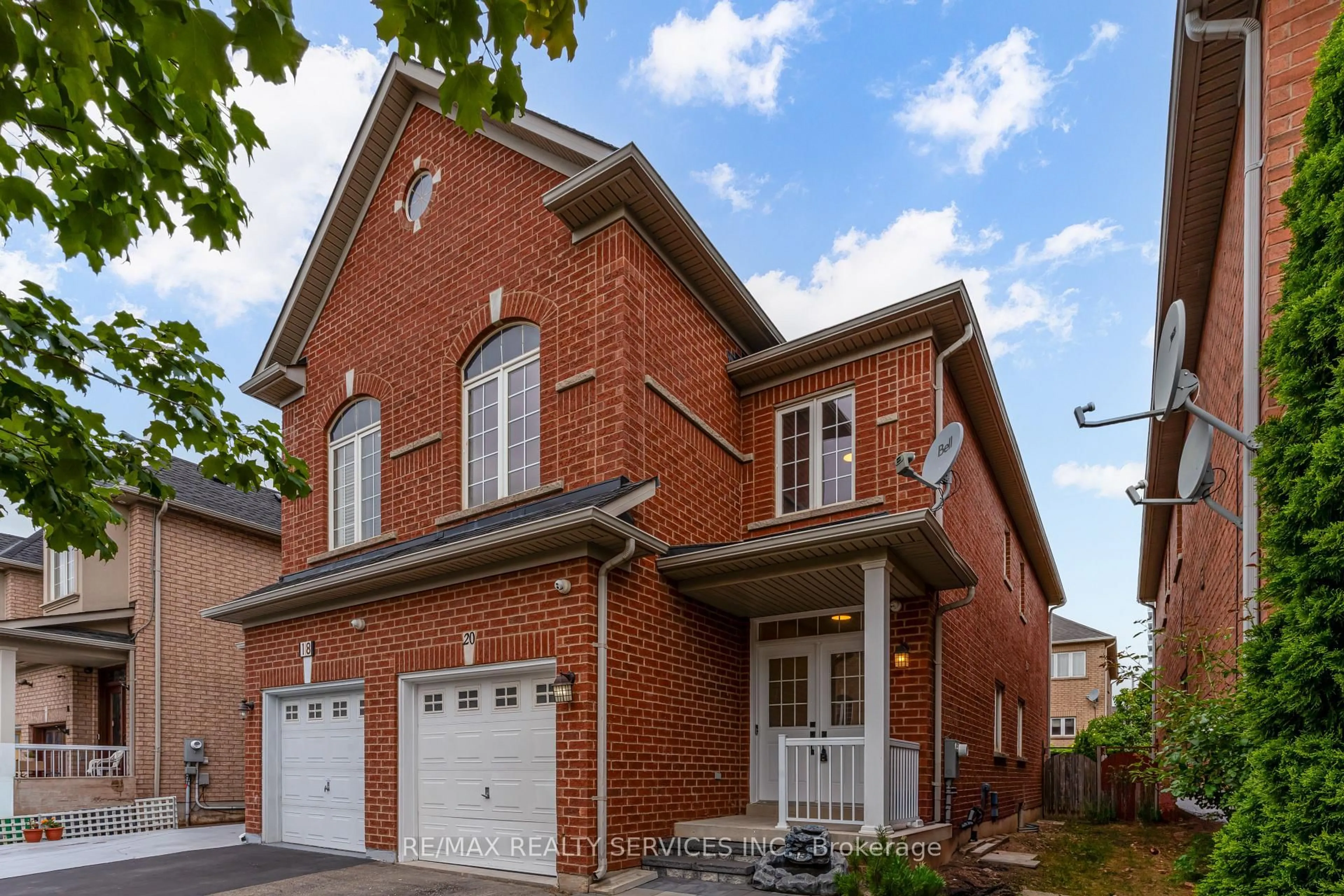Home with brick exterior material, street for 20 Portrush Tr, Brampton Ontario L6X 0R3
