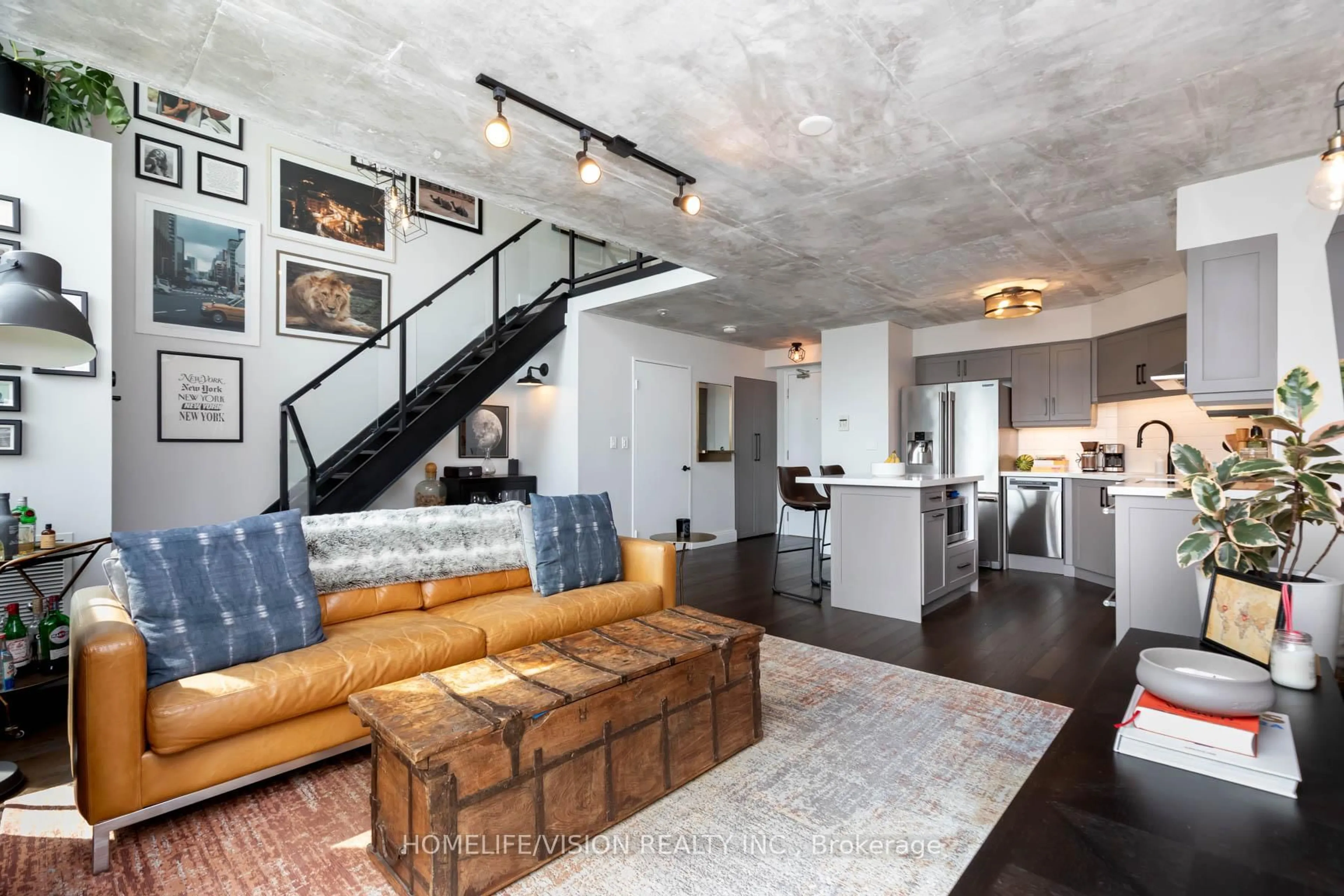 Open concept kitchen, cement floor for 250 Manitoba St #704, Toronto Ontario M8Y 4G8