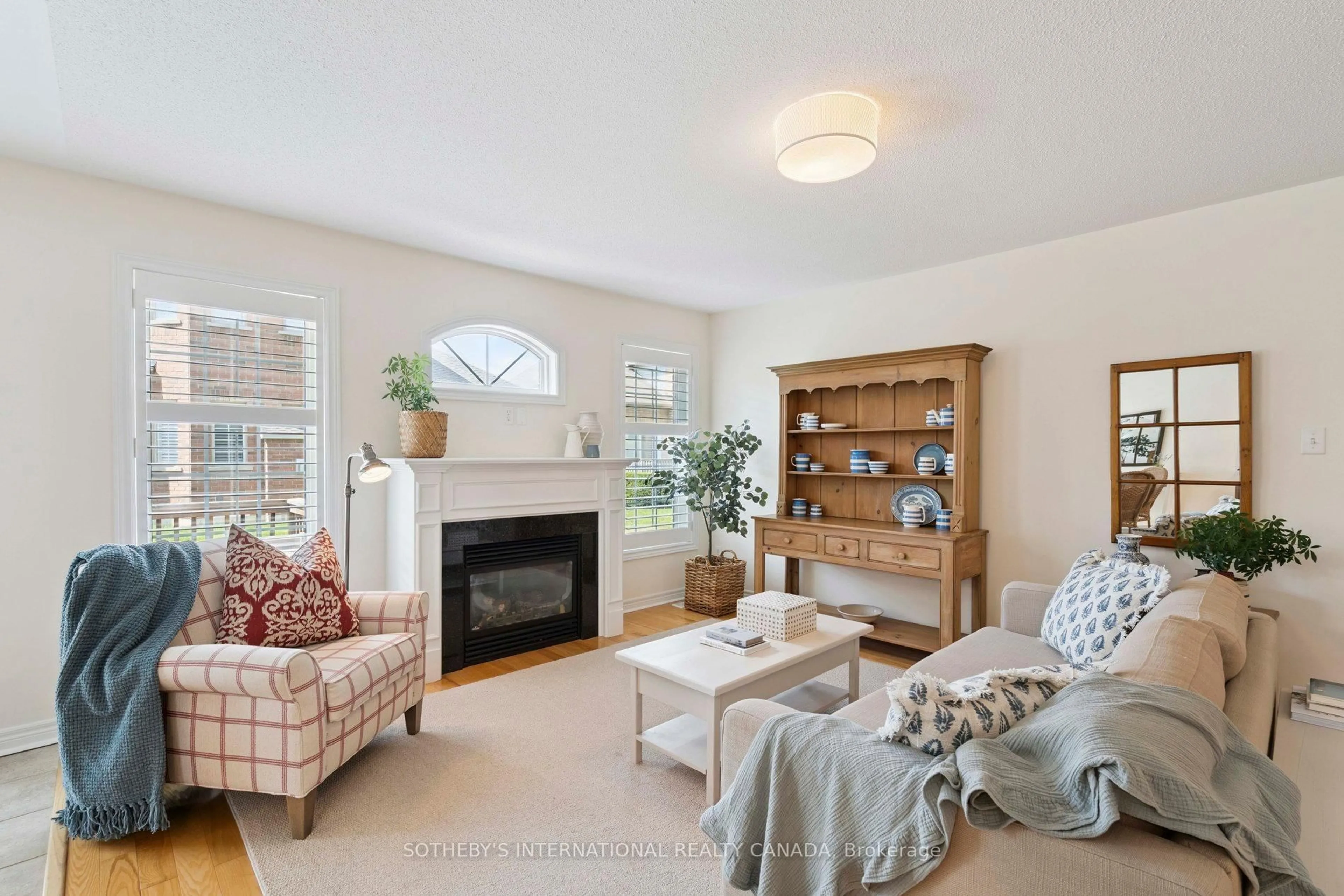 Living room with furniture, unknown for 12 Fairvalley St, Brampton Ontario L6R 0S3