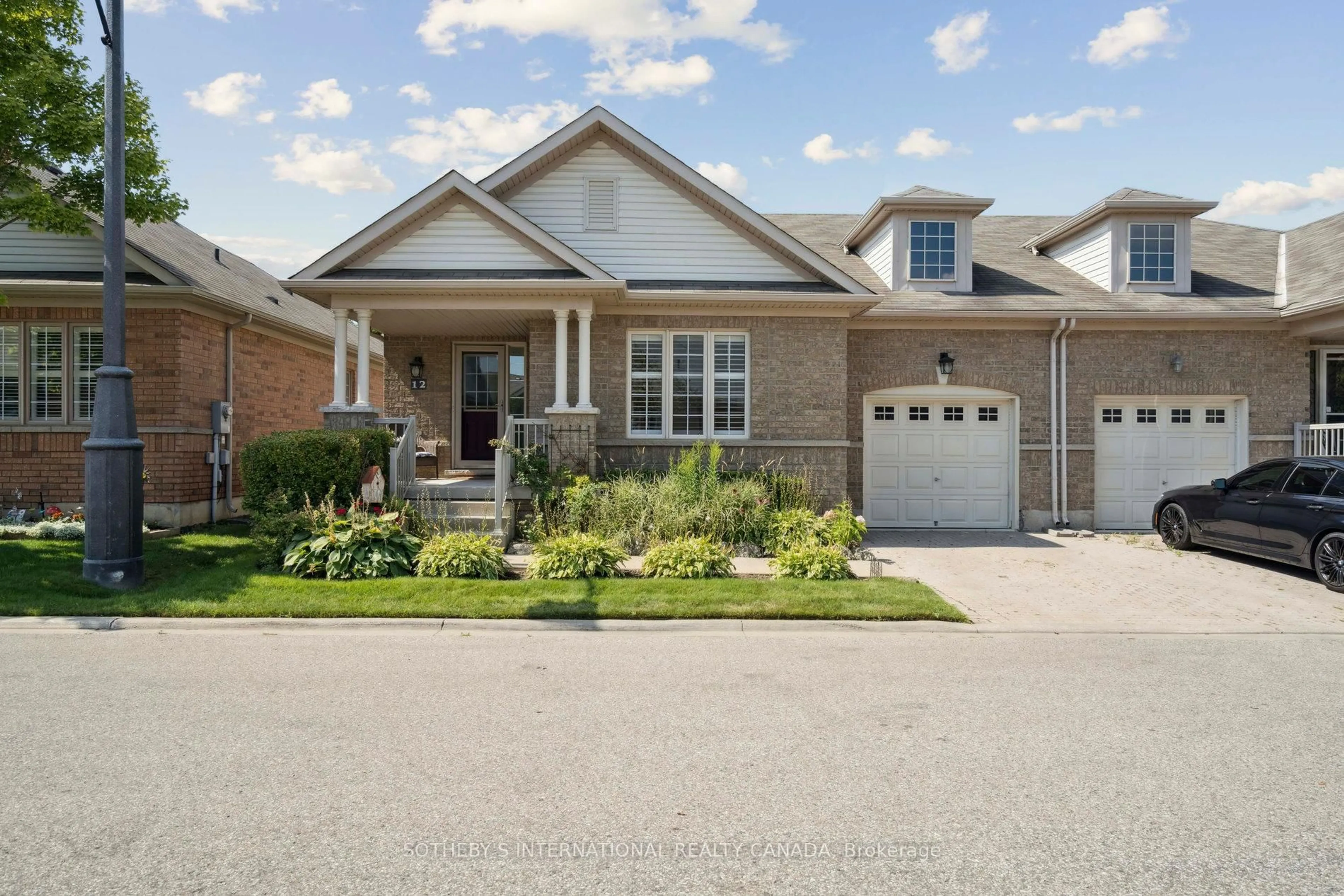Home with brick exterior material, street for 12 Fairvalley St, Brampton Ontario L6R 0S3
