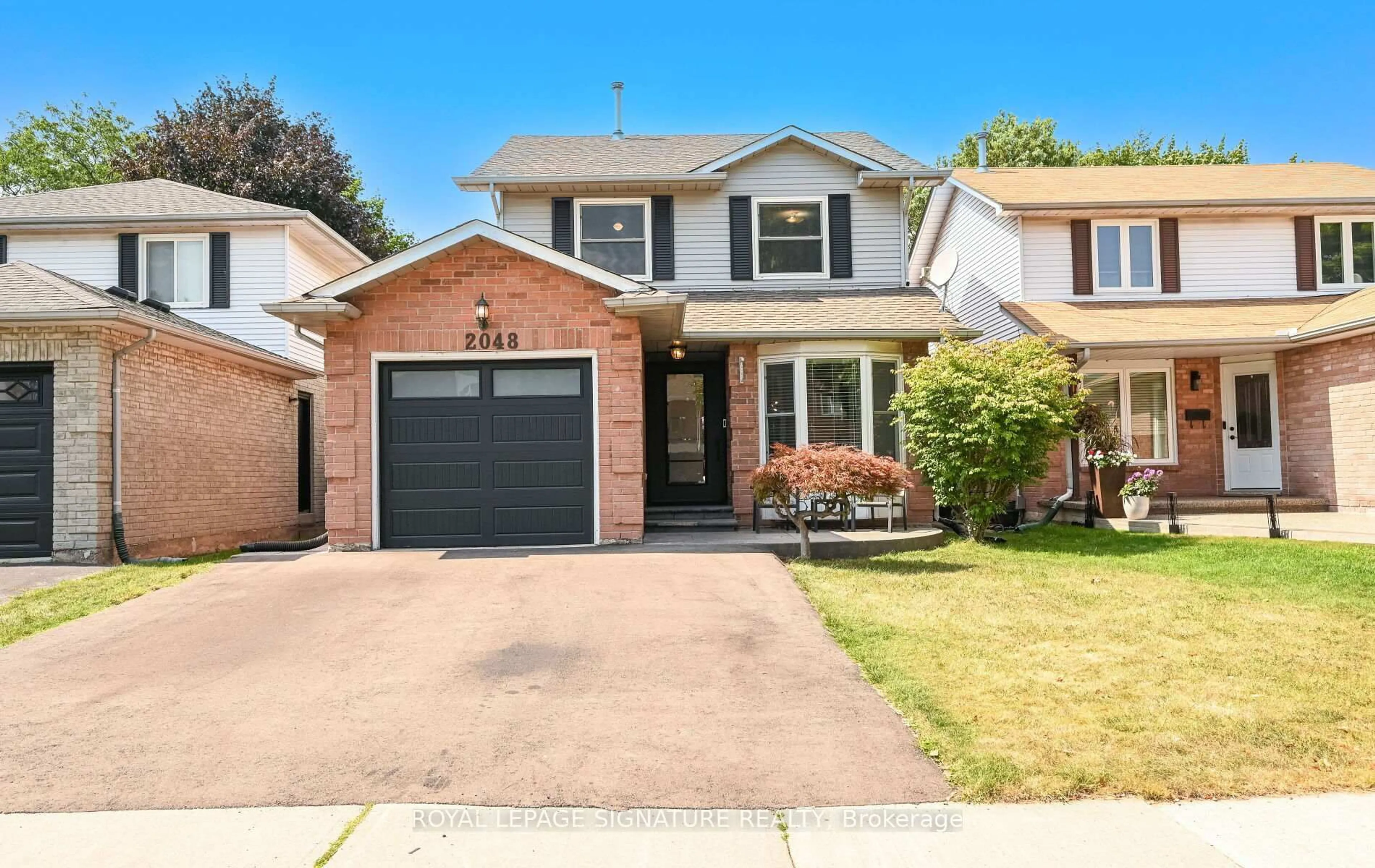 Home with brick exterior material, street for 2048 Chrisdon Rd, Burlington Ontario L7M 3W9
