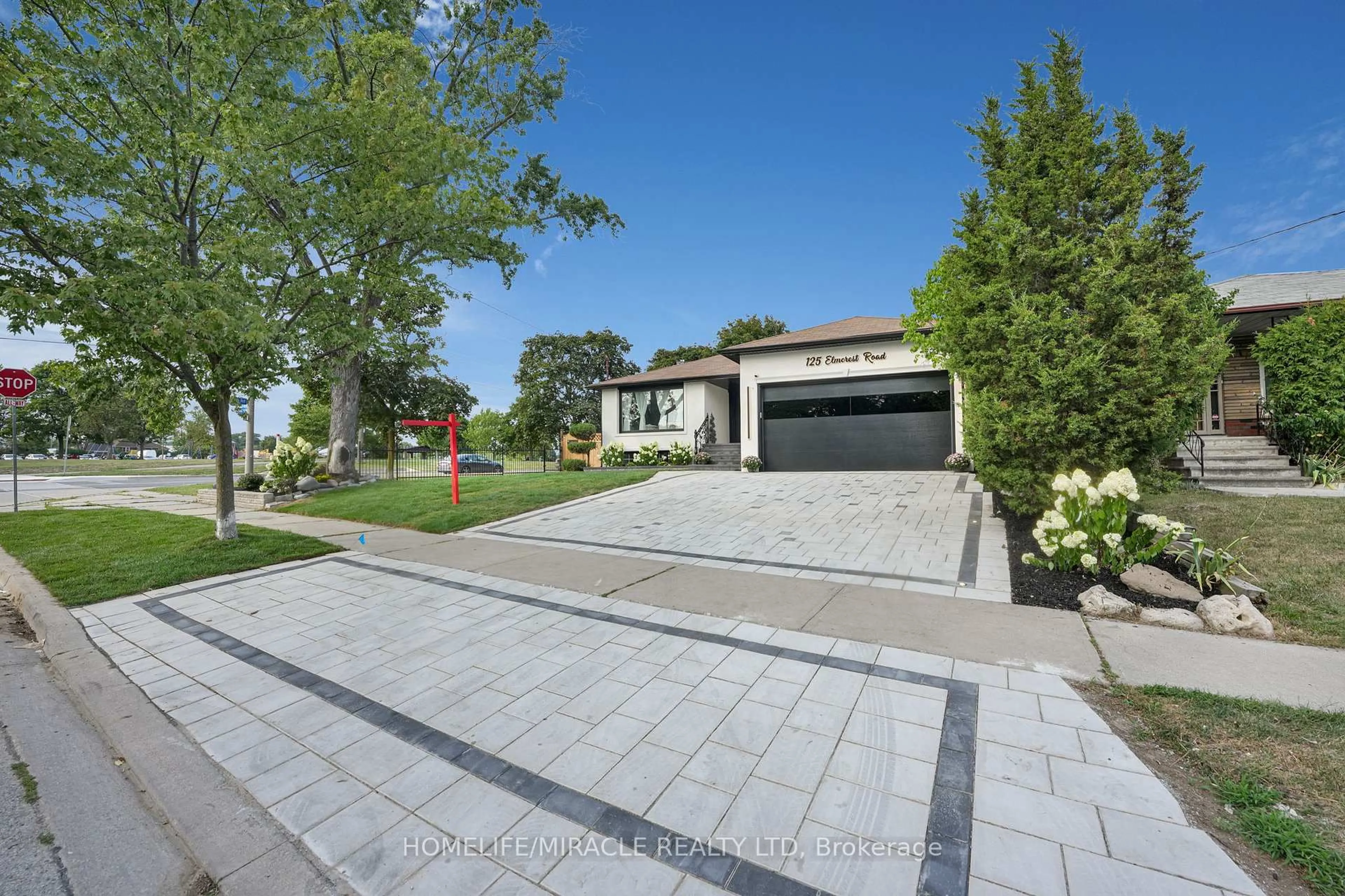 A pic from outside/outdoor area/front of a property/back of a property/a pic from drone, street for 125 Elmcrest Rd, Toronto Ontario M9C 3R5