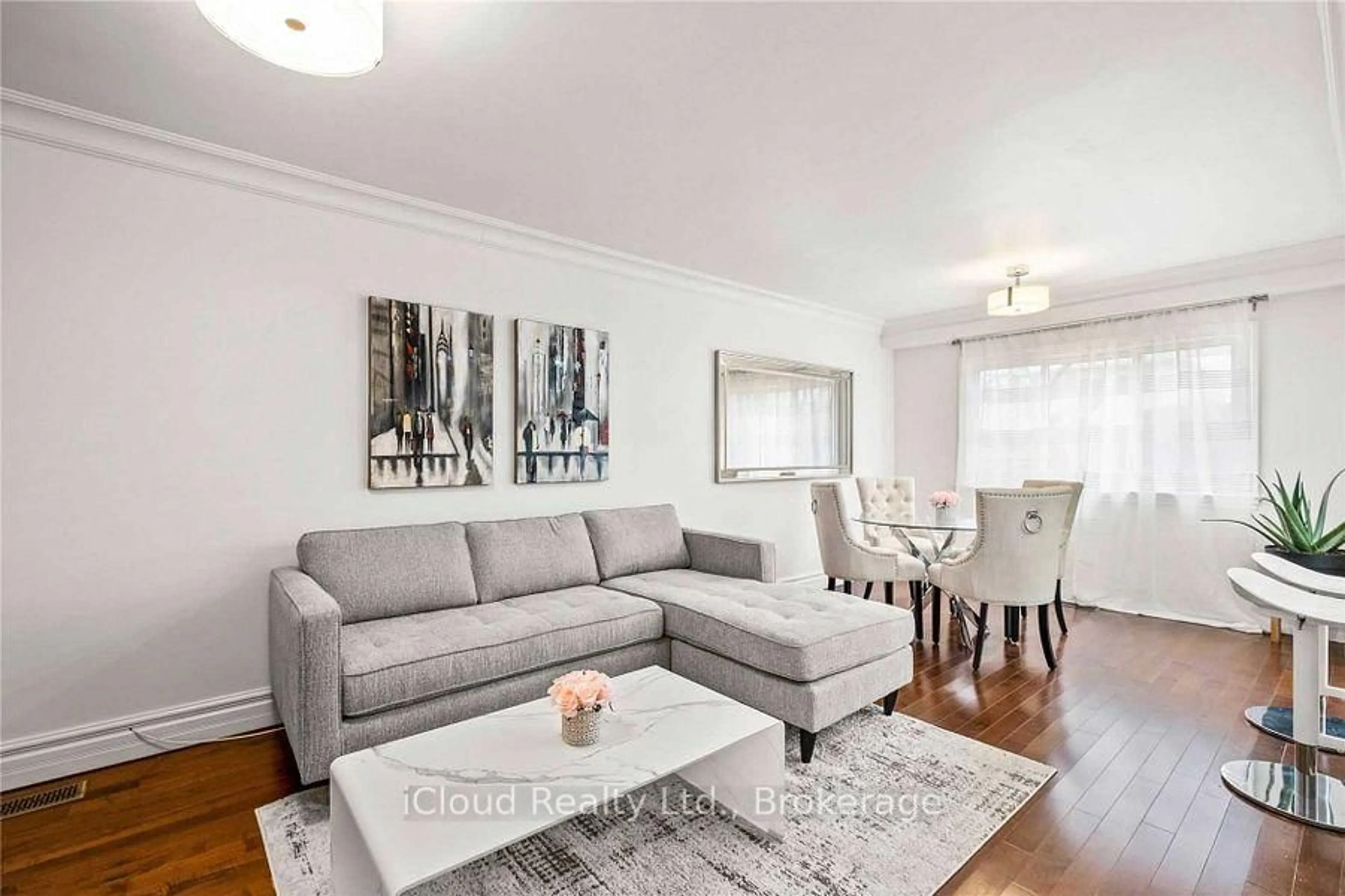 Living room with furniture, wood/laminate floor for 2764 Willowmore Way, Mississauga Ontario L5N 3N9