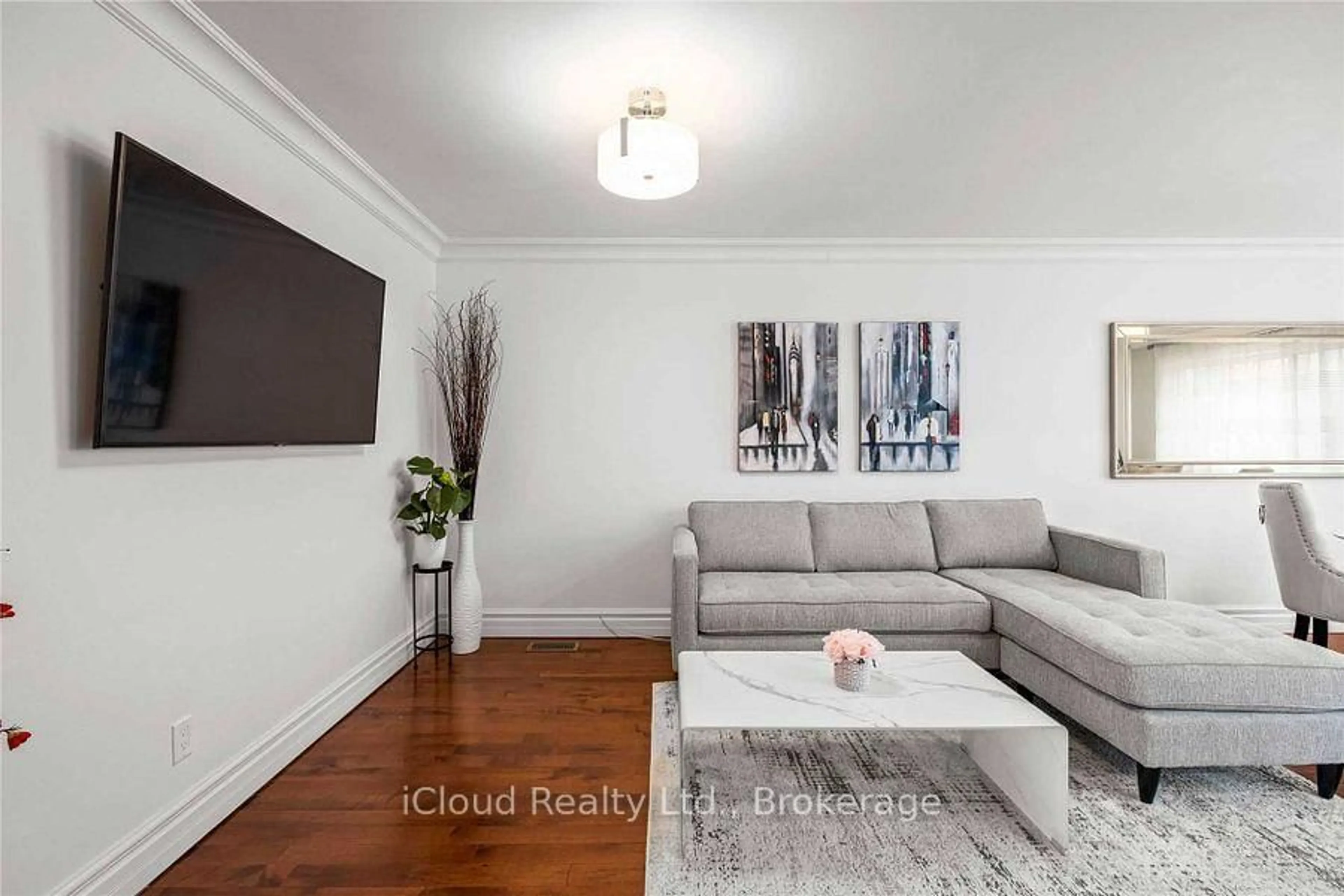 Living room with furniture, wood/laminate floor for 2764 Willowmore Way, Mississauga Ontario L5N 3N9