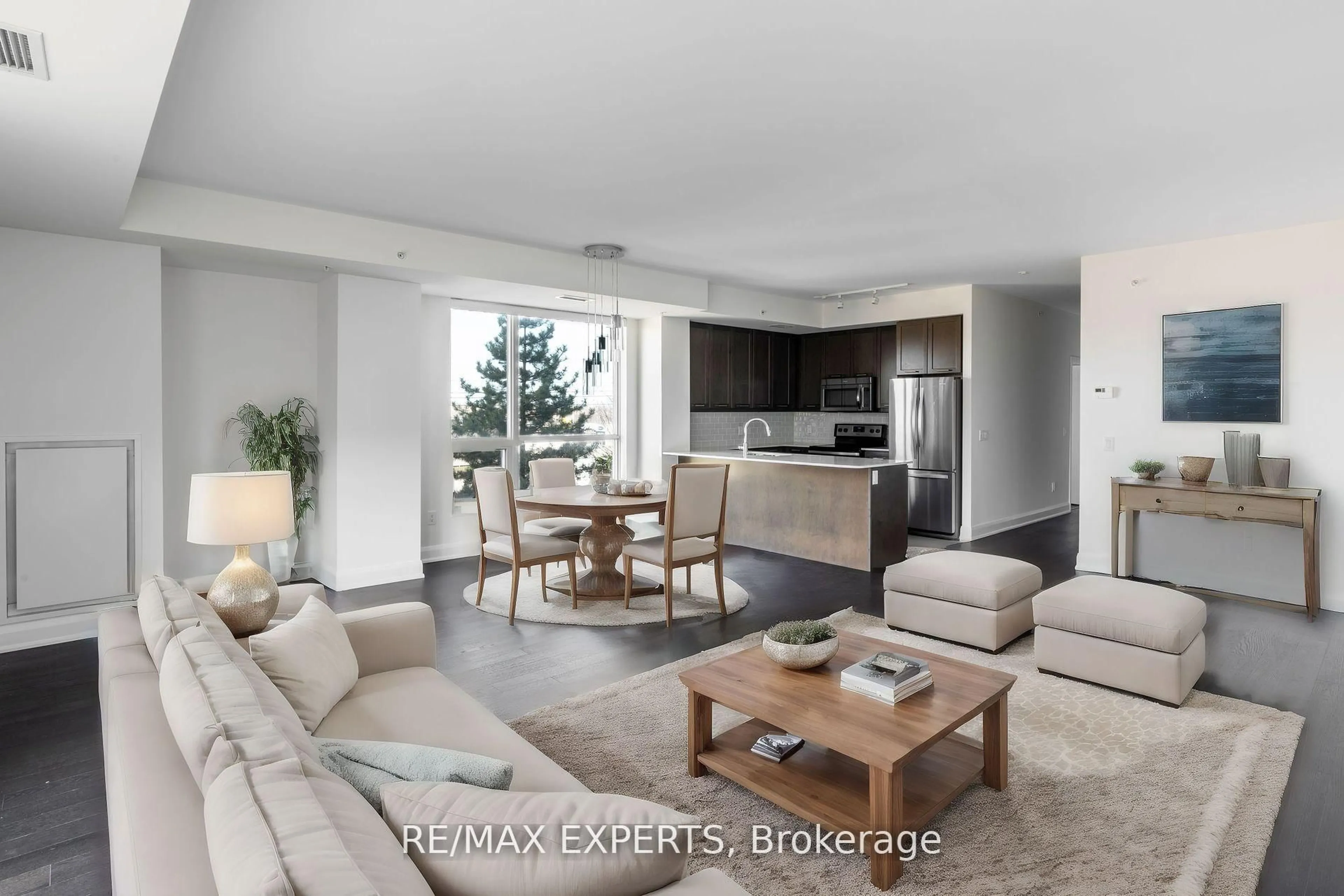 Living room with furniture, unknown for 2480 Prince Michael Dr #210, Oakville Ontario L6H 0H1