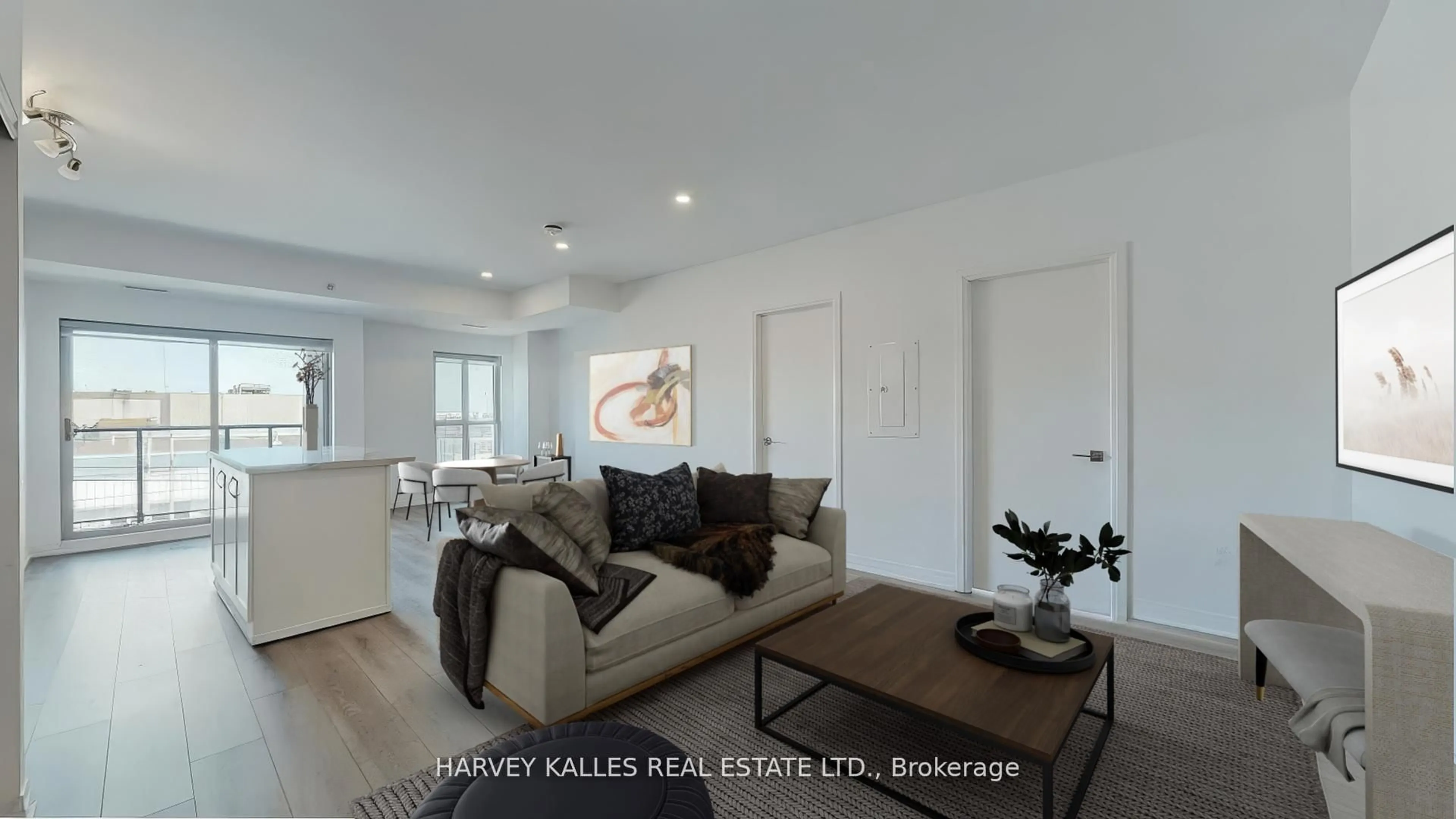 Living room with furniture, wood/laminate floor for 408 Browns Line #310, Toronto Ontario M8W 0C3