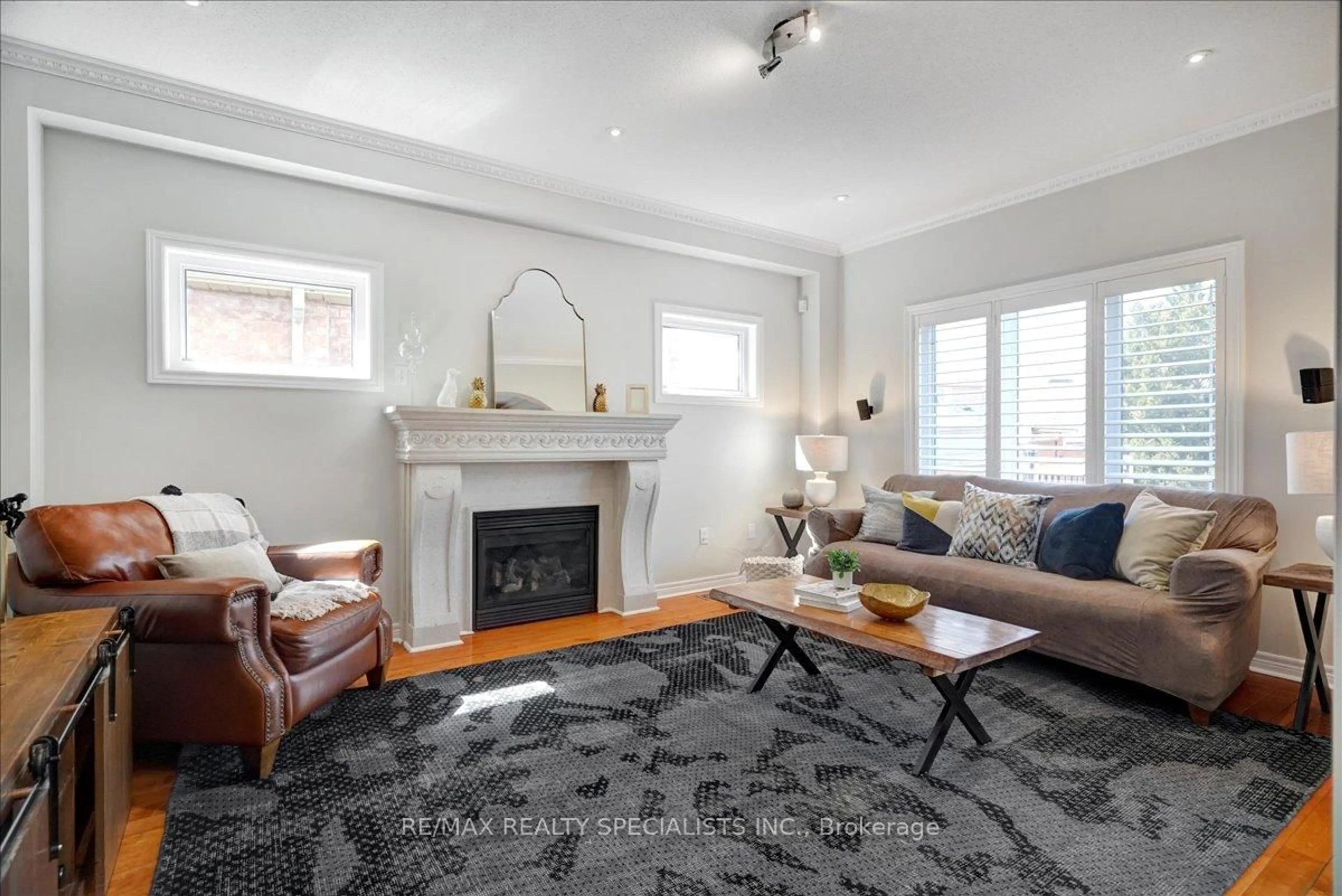 Living room with furniture, unknown for 104 Earlsbridge Blvd, Brampton Ontario L7A 3W7