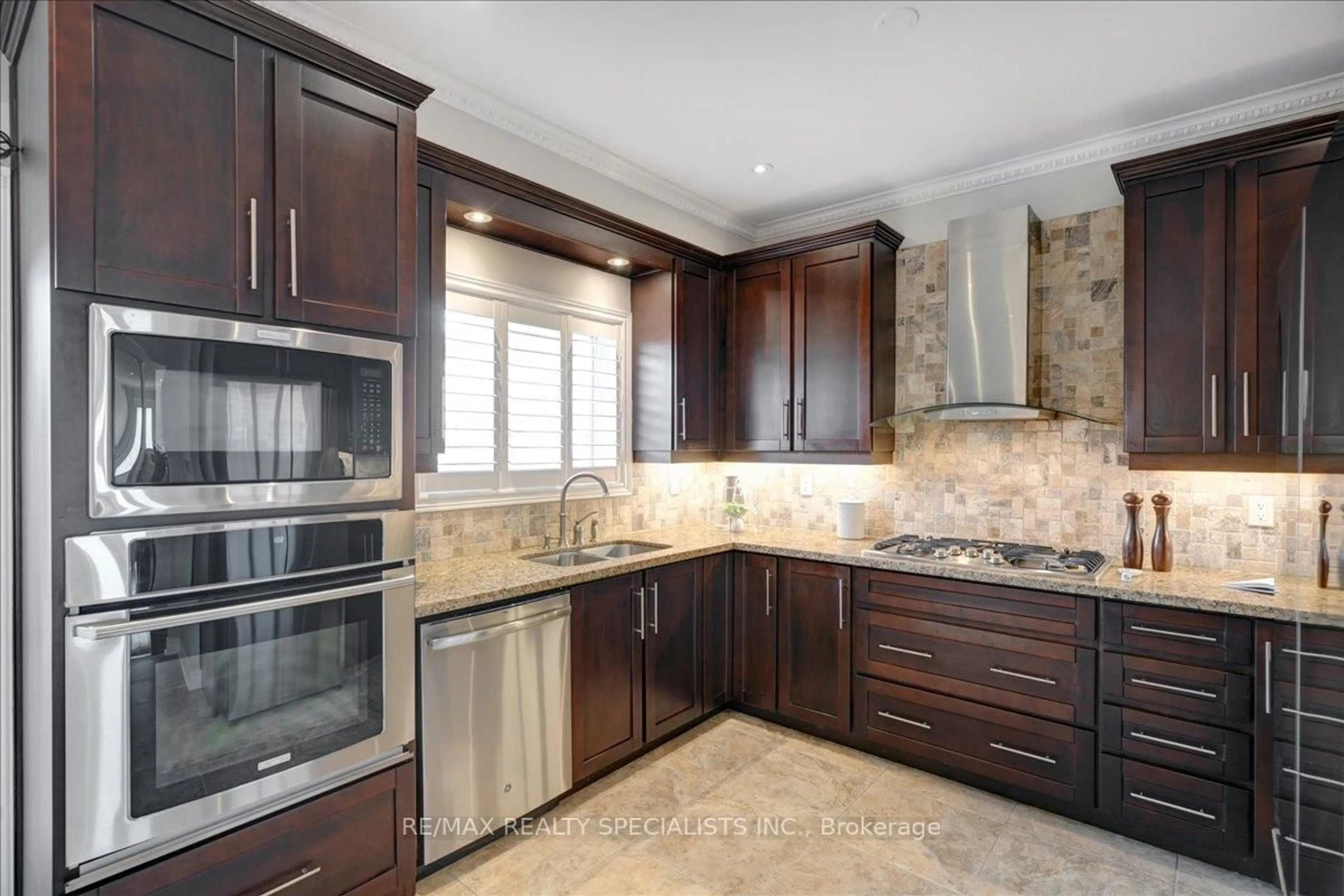 Contemporary kitchen, ceramic/tile floor for 104 Earlsbridge Blvd, Brampton Ontario L7A 3W7