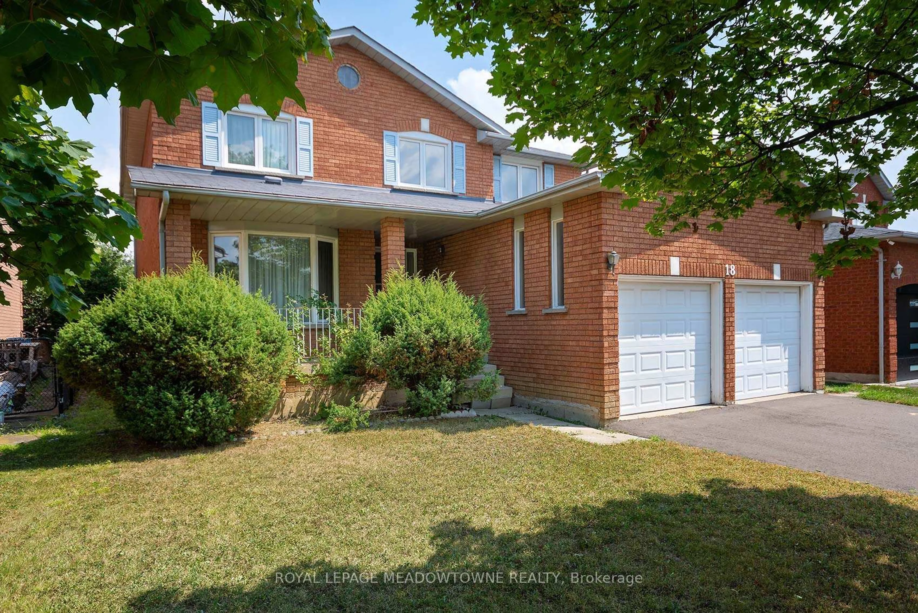 Home with brick exterior material, street for 18 Blue Bonnet Dr, Brampton Ontario L6Y 4N4