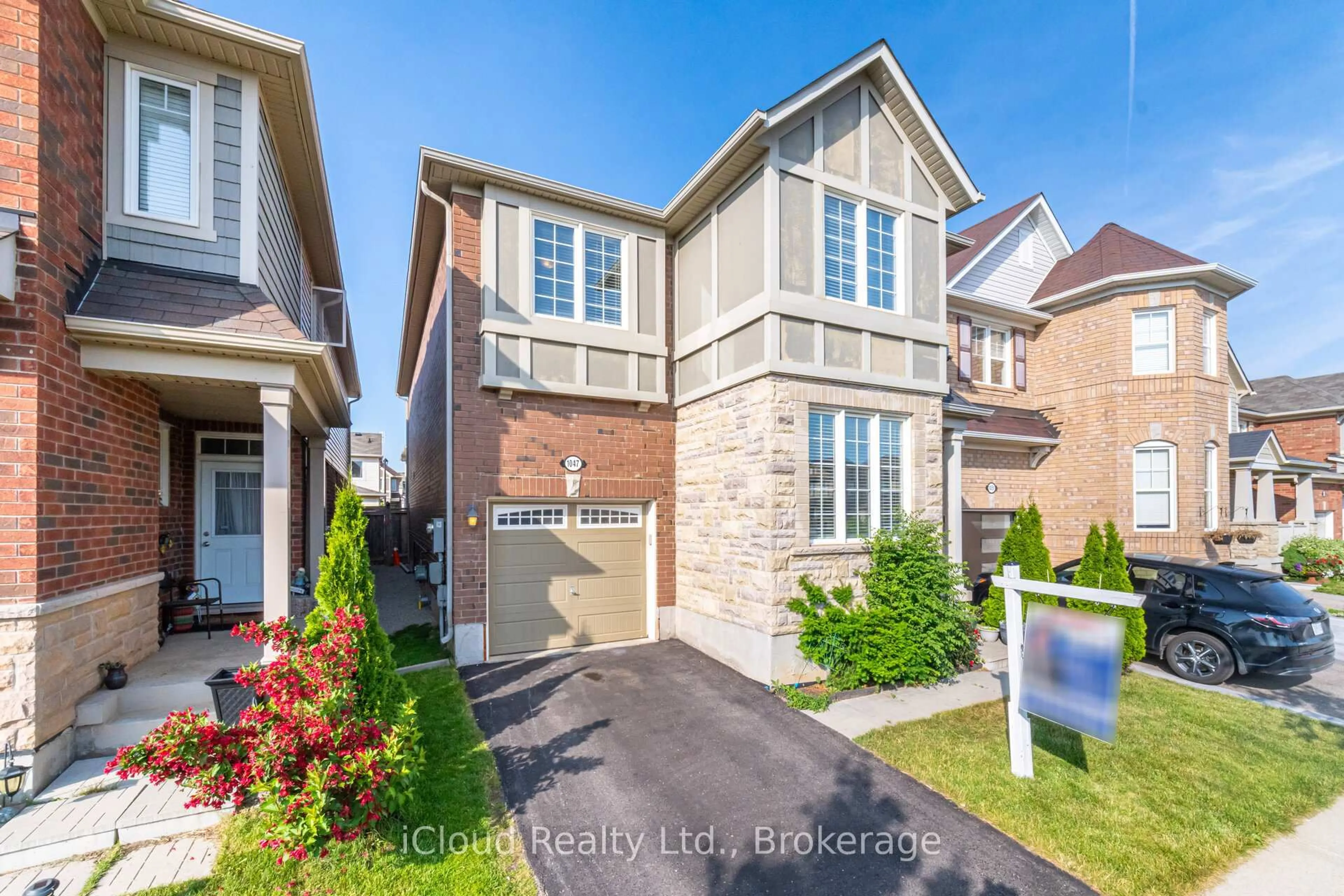 Home with brick exterior material, street for 1047 Savoline Blvd, Milton Ontario L9T 8P2