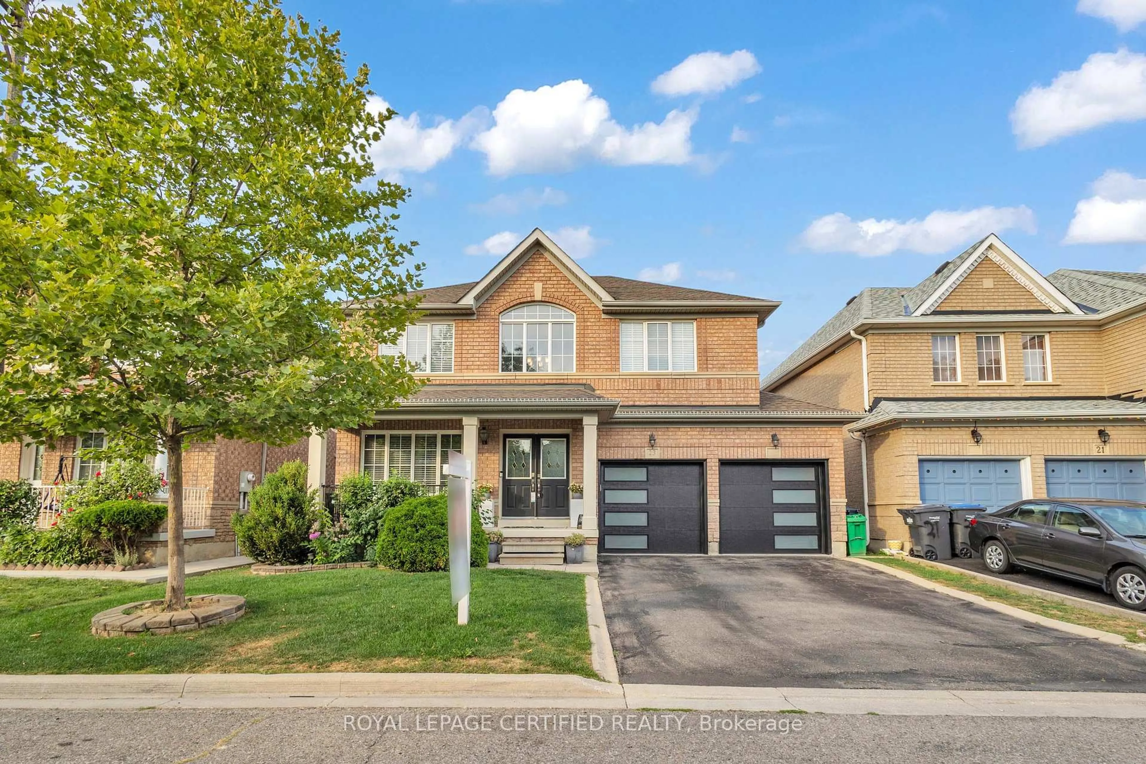 Home with brick exterior material, street for 23 Foxmere Rd, Brampton Ontario L7A 1S4