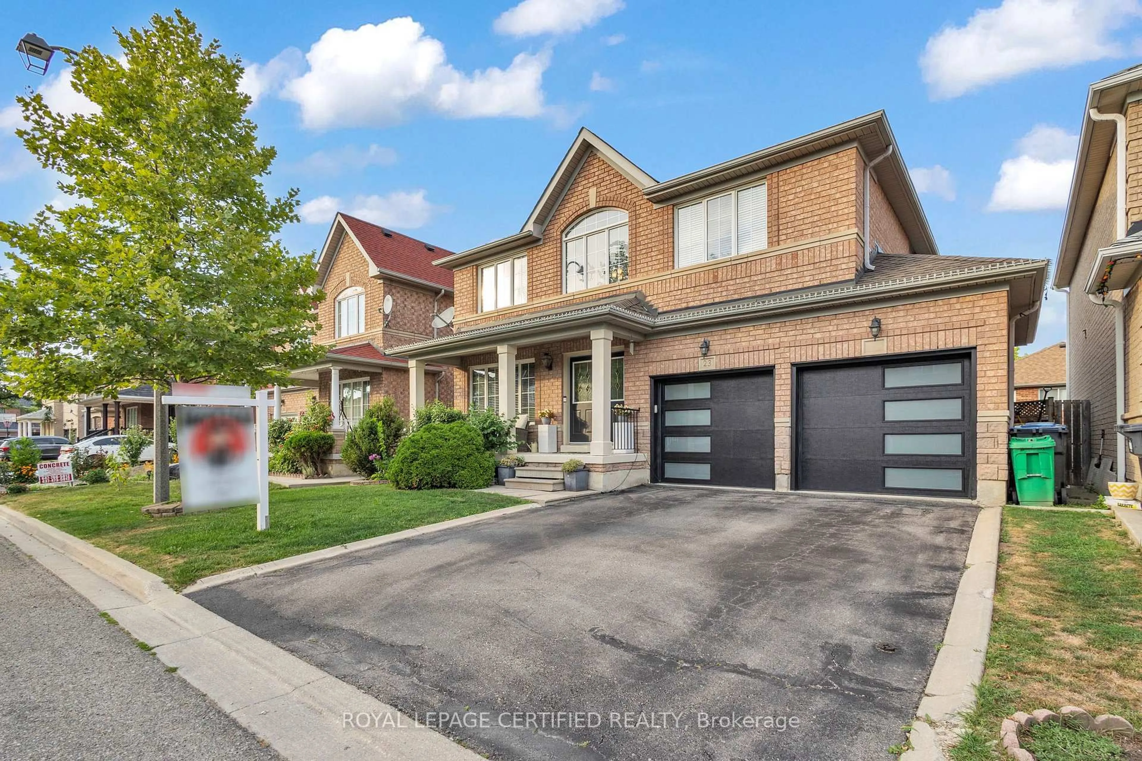 Home with brick exterior material, street for 23 Foxmere Rd, Brampton Ontario L7A 1S4