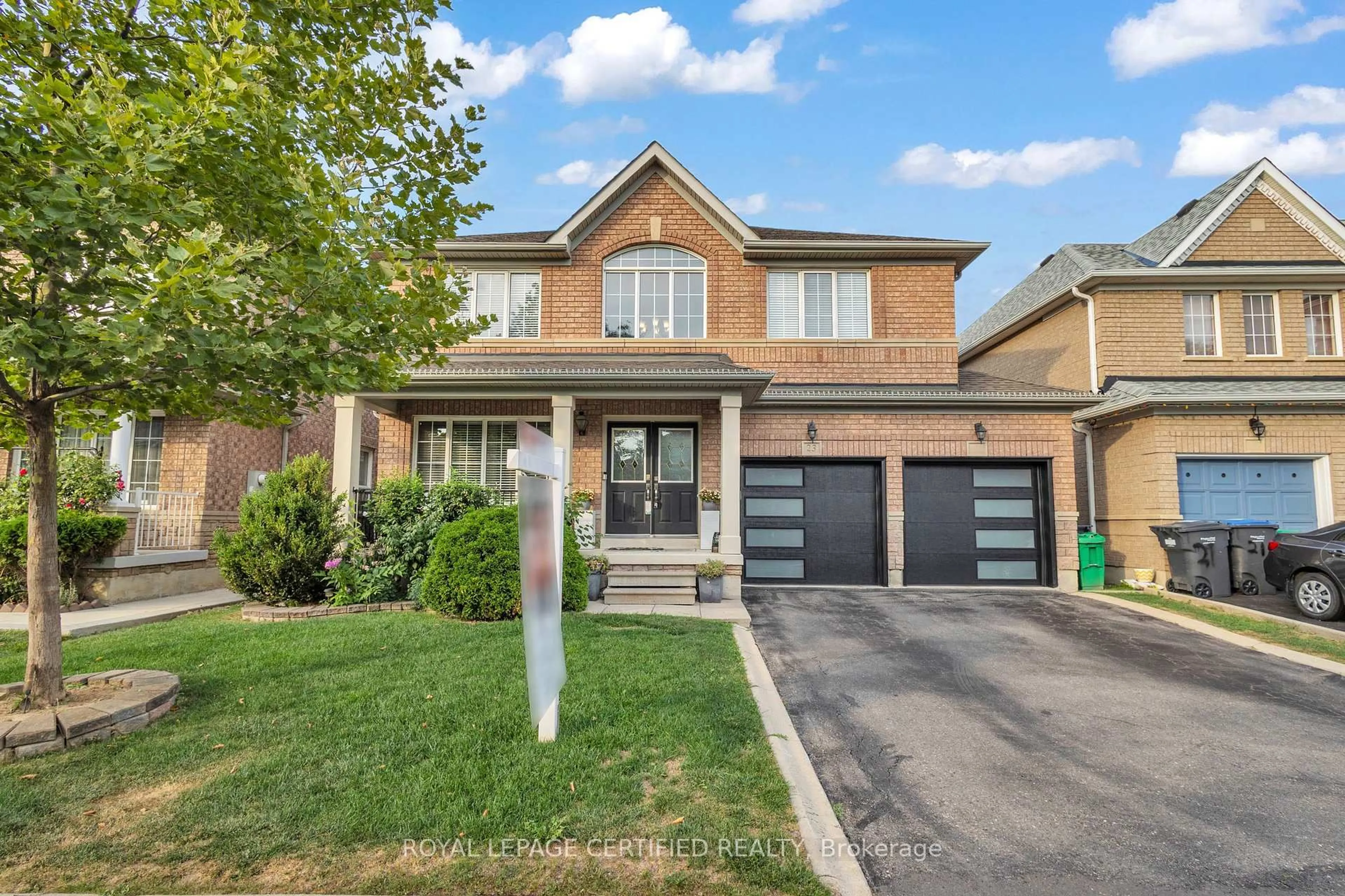 Home with brick exterior material, street for 23 Foxmere Rd, Brampton Ontario L7A 1S4