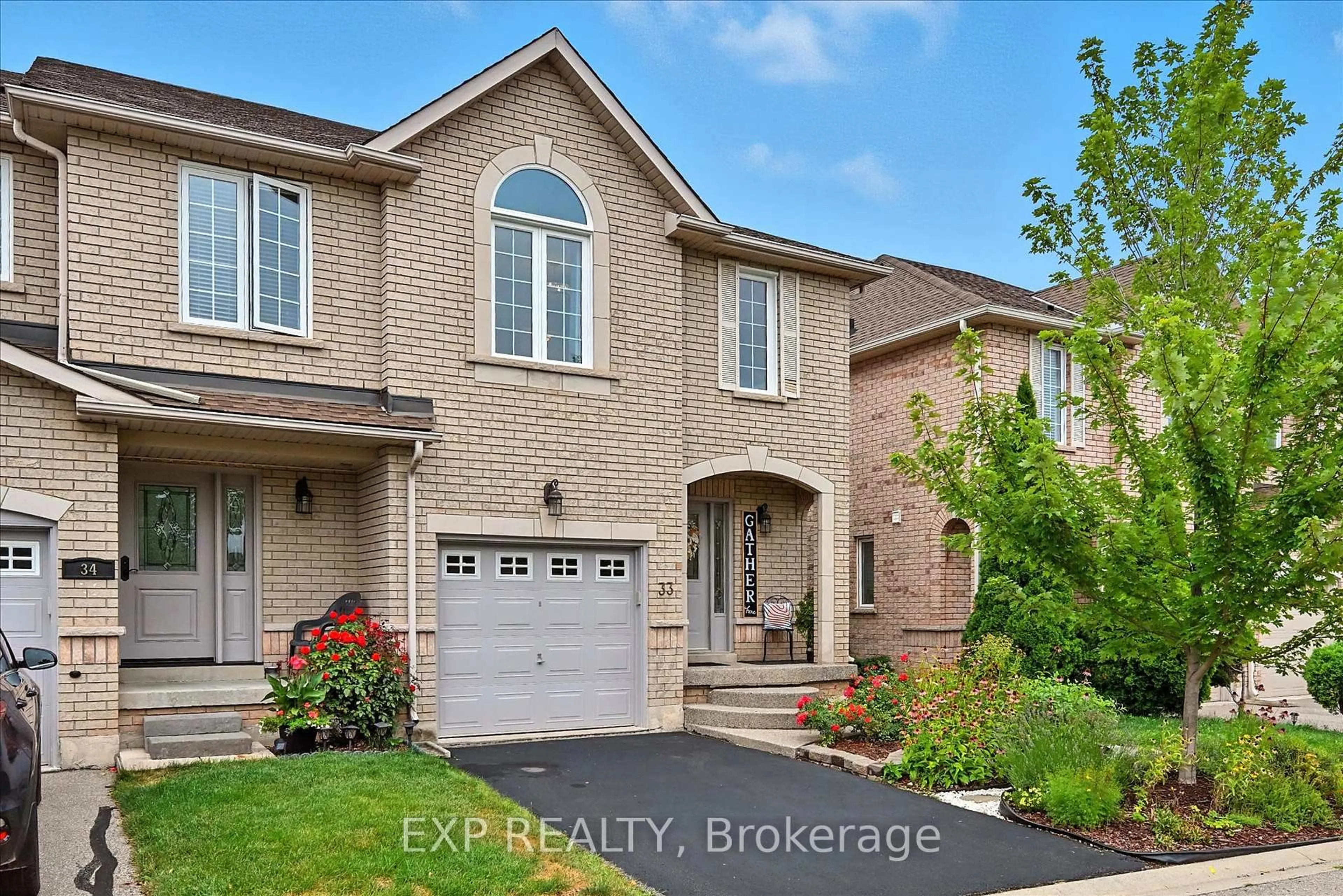 Home with brick exterior material, street for 1551 Reeves Gate #33, Oakville Ontario L6M 5C5