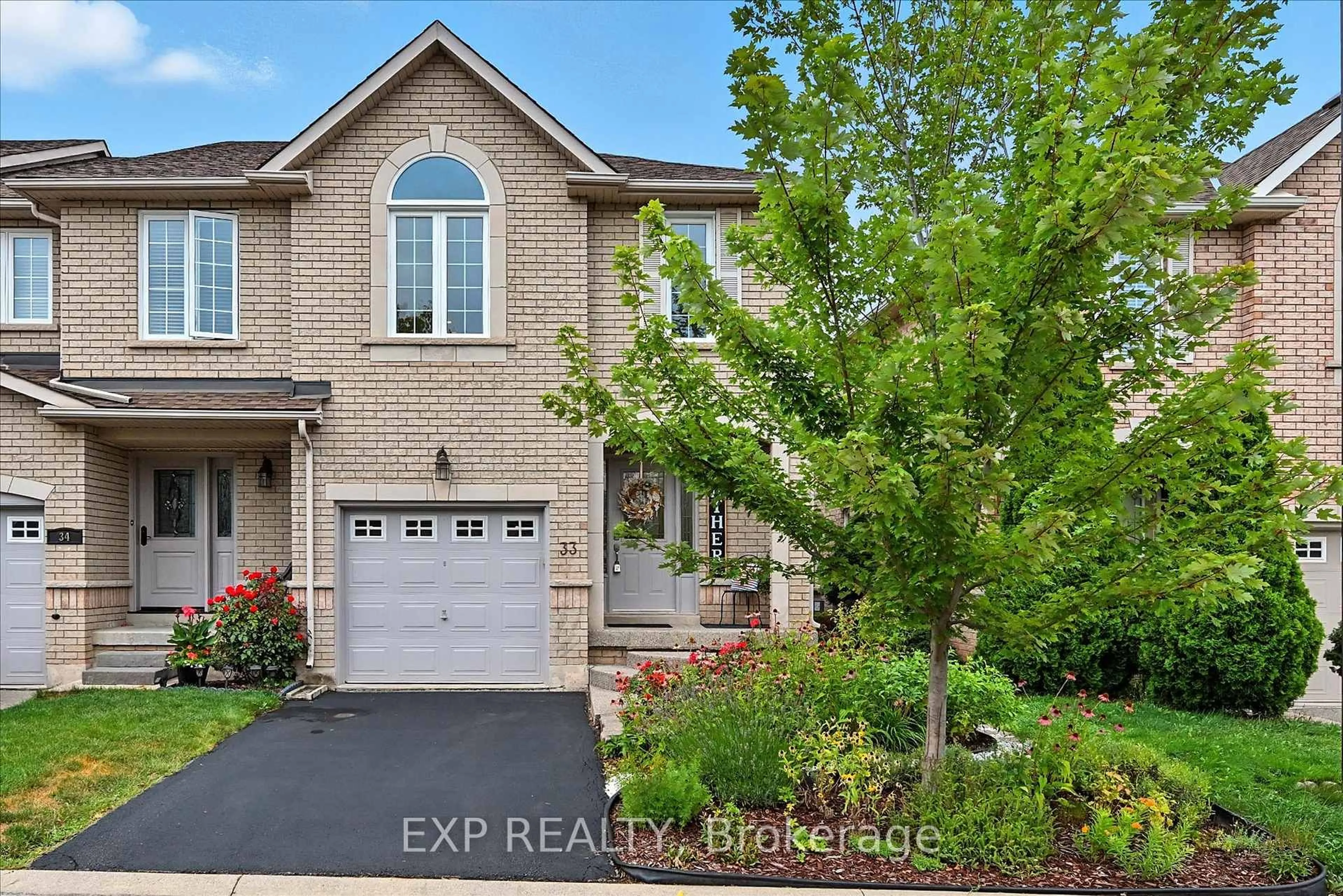 Home with brick exterior material, street for 1551 Reeves Gate #33, Oakville Ontario L6M 5C5