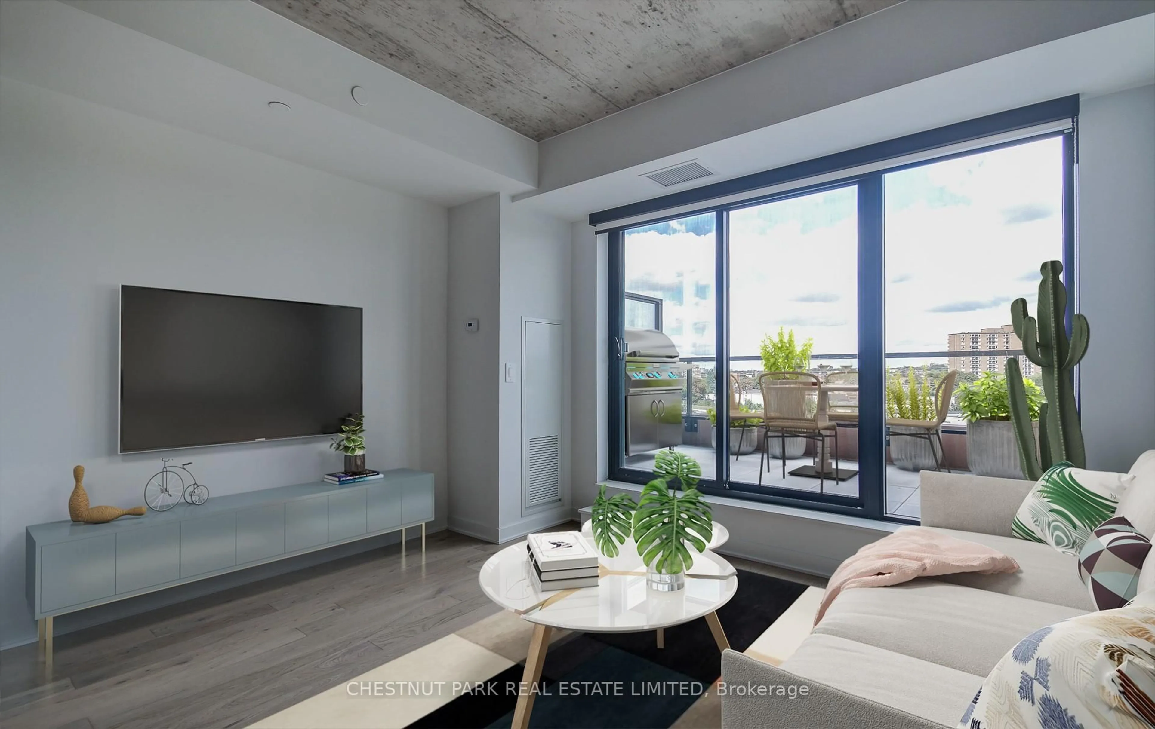 Living room with furniture, cement floor for 2720 Dundas St #613, Toronto Ontario M6P 1Y2