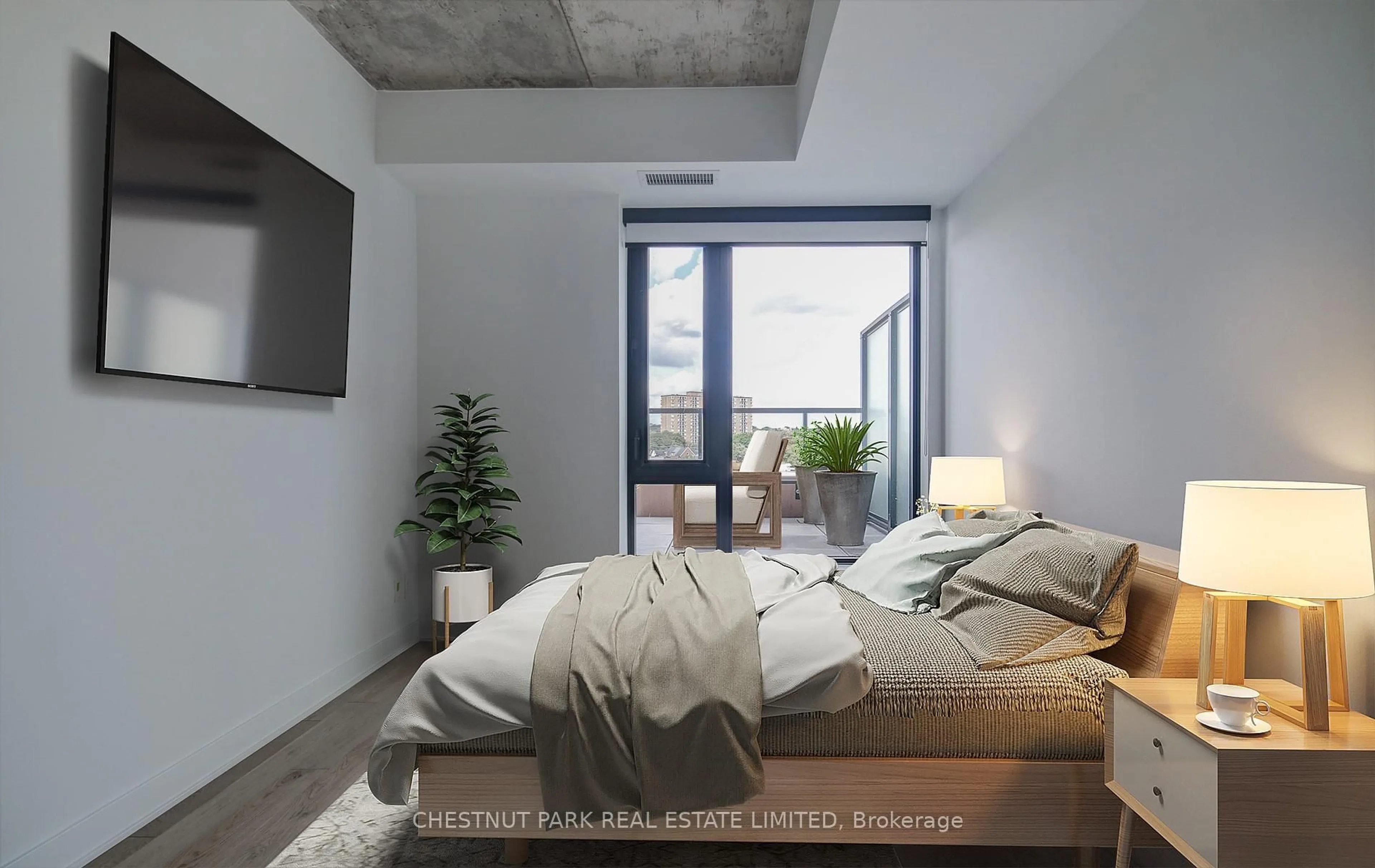 Bedroom with bed, cement floor for 2720 Dundas St #613, Toronto Ontario M6P 1Y2