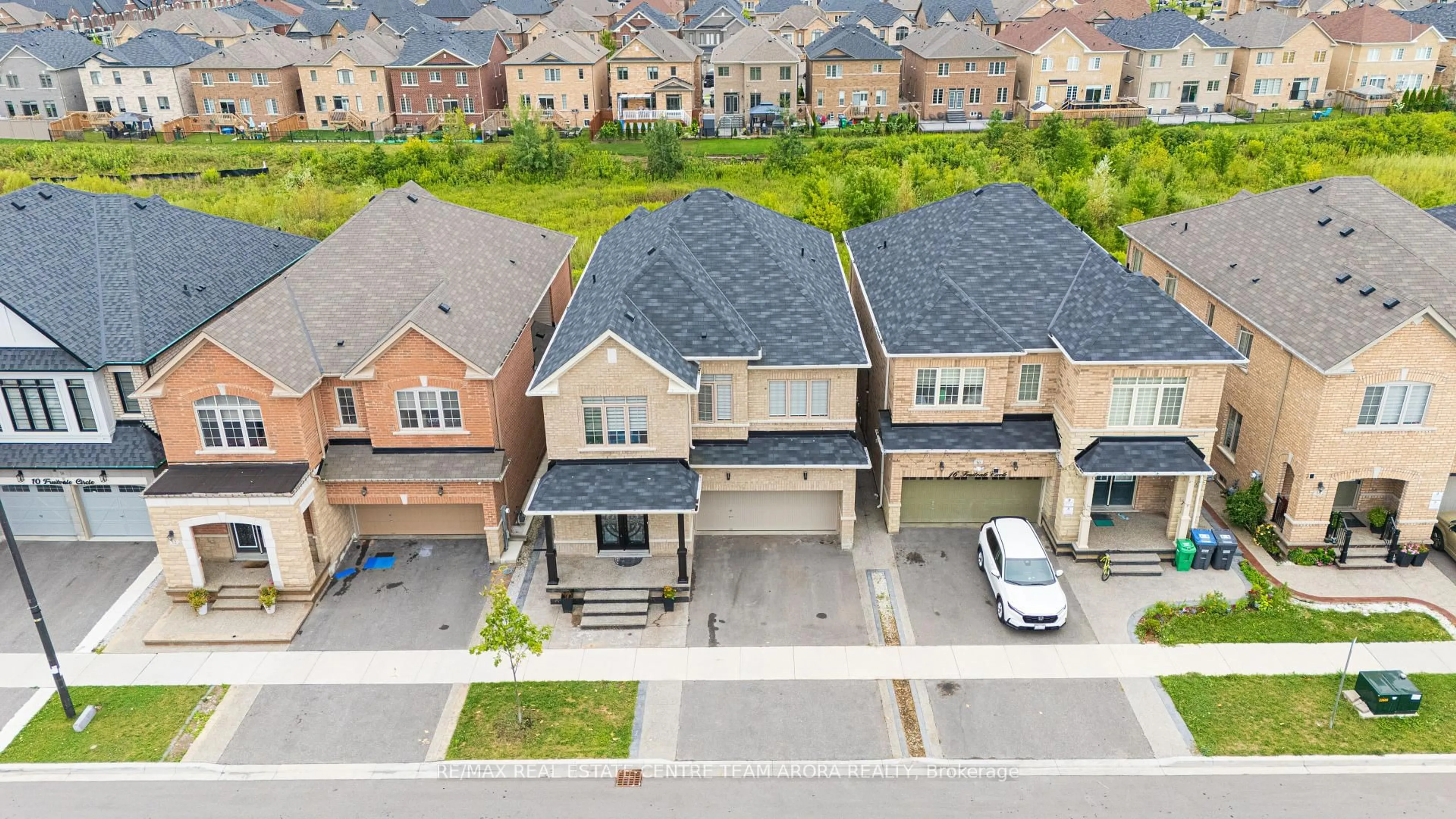 A pic from outside/outdoor area/front of a property/back of a property/a pic from drone, street for 14 Fruitvale Circ, Brampton Ontario L7A 5B8