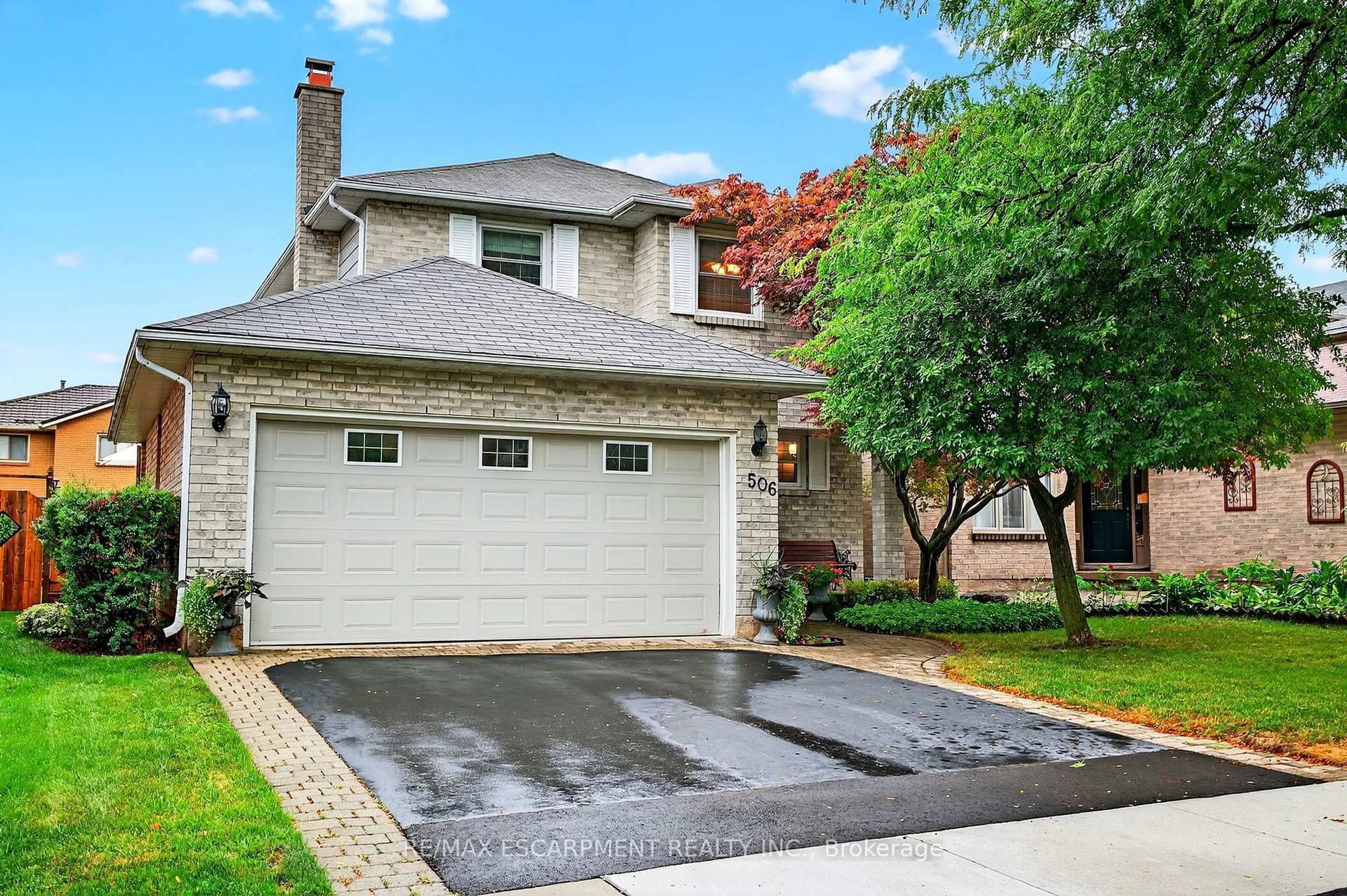 Home with brick exterior material, street for 506 Deerhurst Dr, Burlington Ontario L7L 5S8