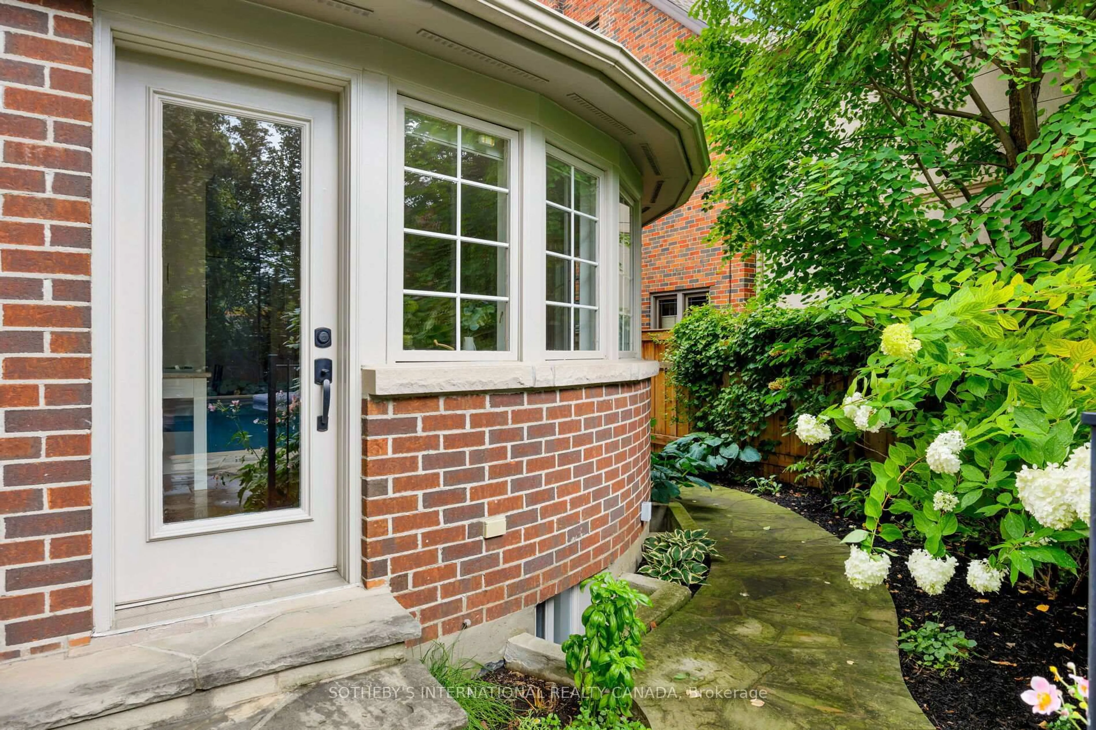 Home with brick exterior material, street for 67 King Georges Rd, Toronto Ontario M8X 1L8