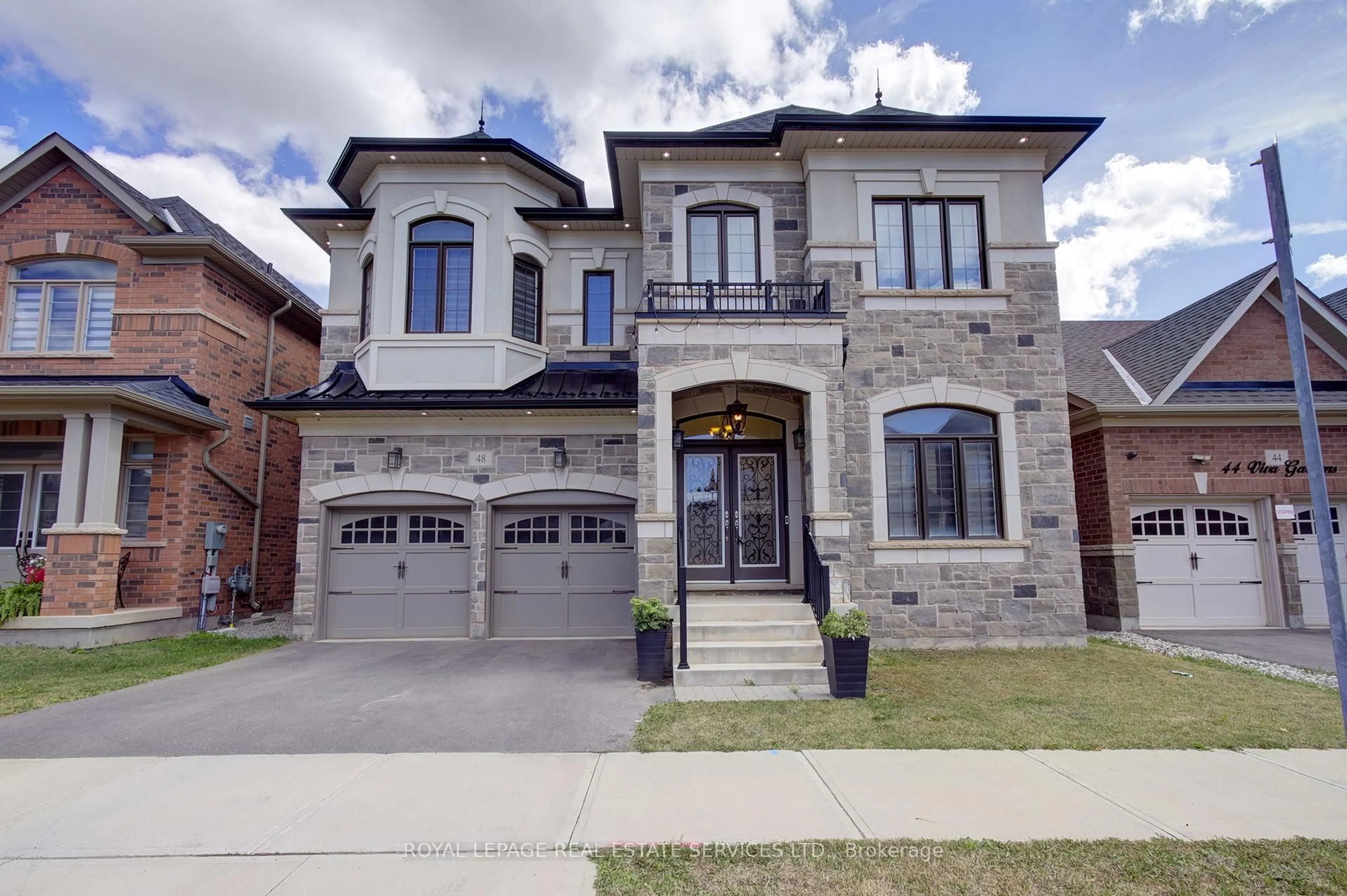 Home with brick exterior material, street for 48 Viva Gardens, Oakville Ontario L6H 0Z1
