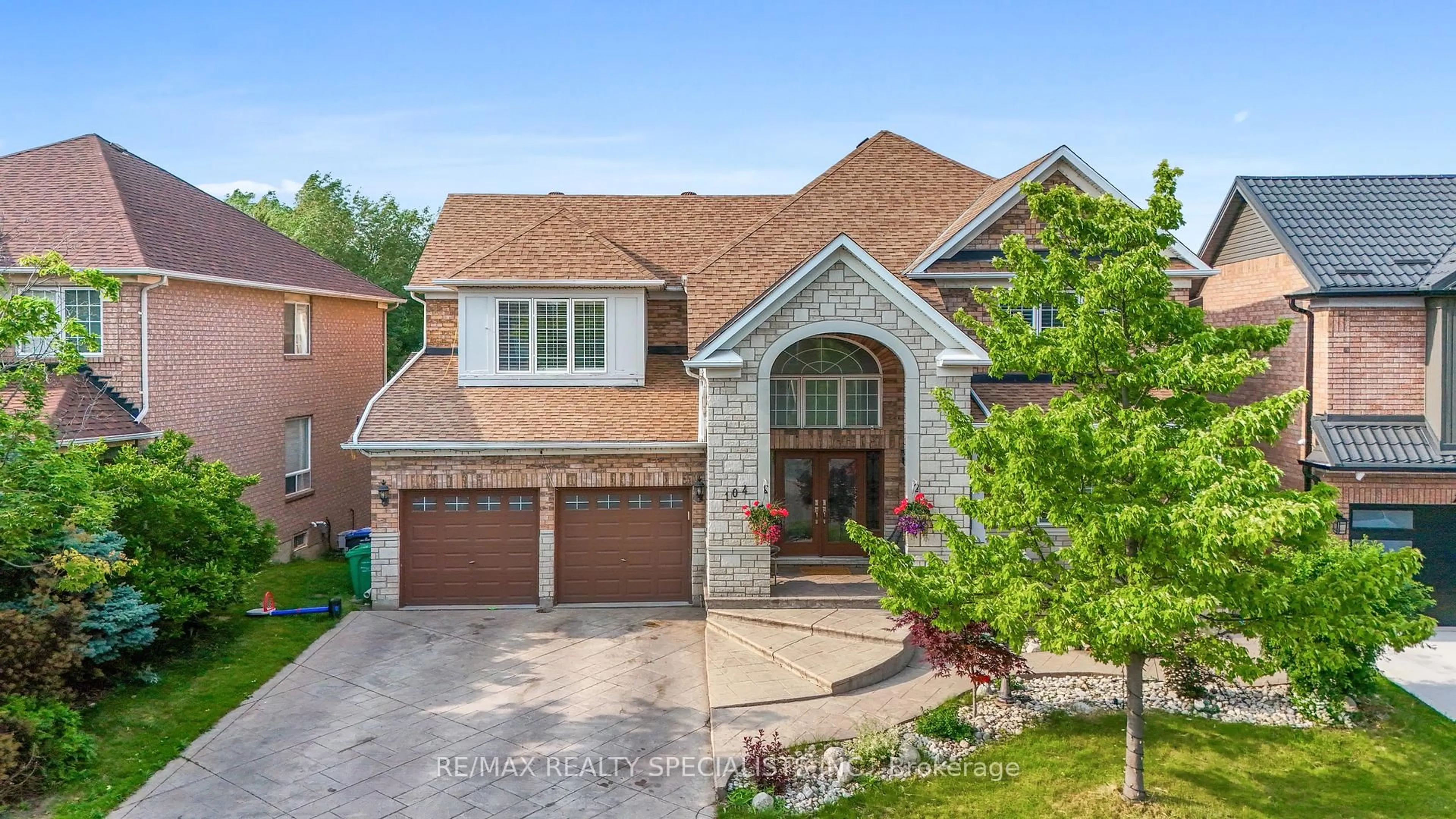 Home with brick exterior material, street for 104 Treeline Blvd, Brampton Ontario L6P 1A7