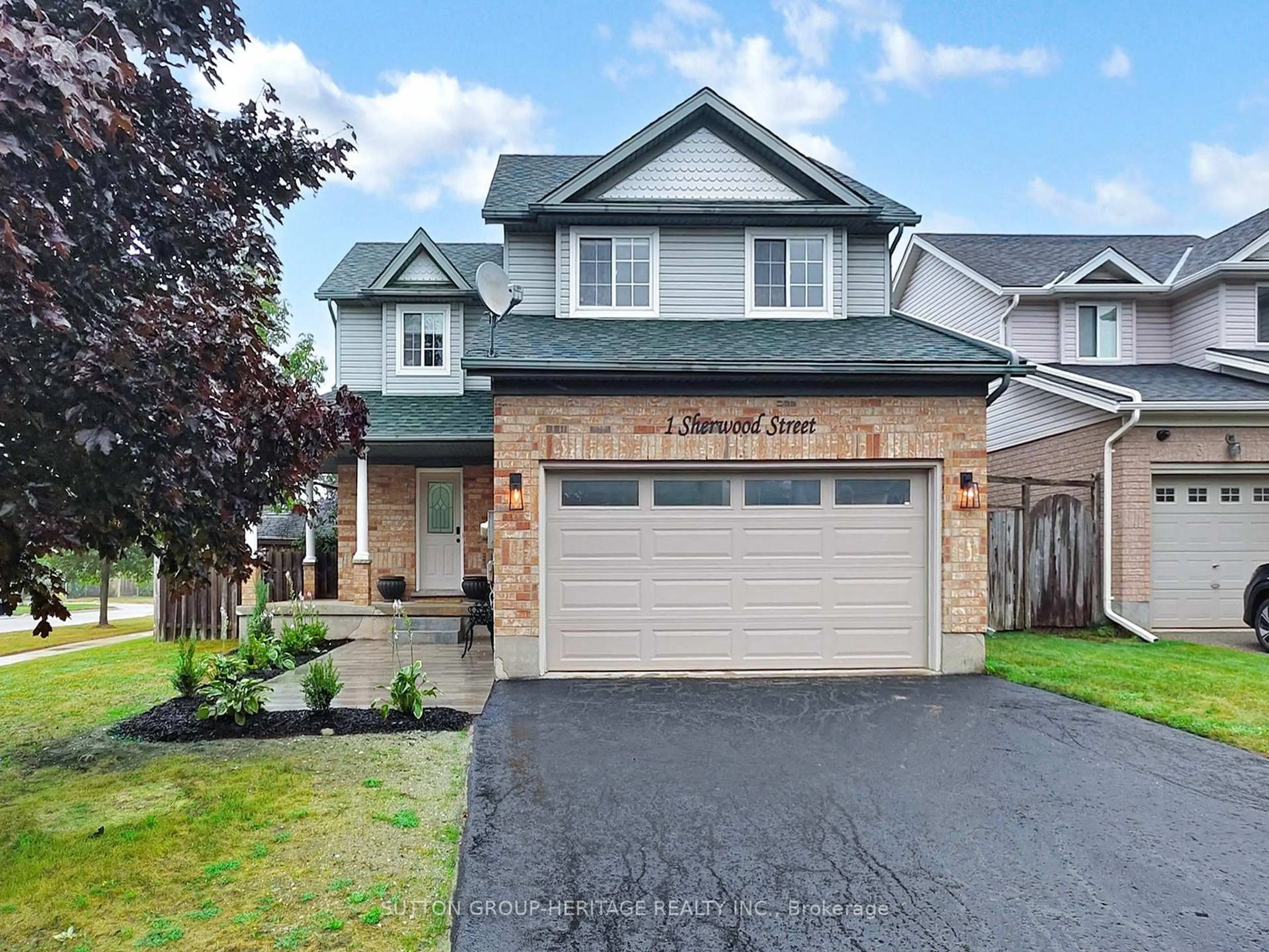 Home with vinyl exterior material, street for 1 Sherwood St, Orangeville Ontario L9W 5A5