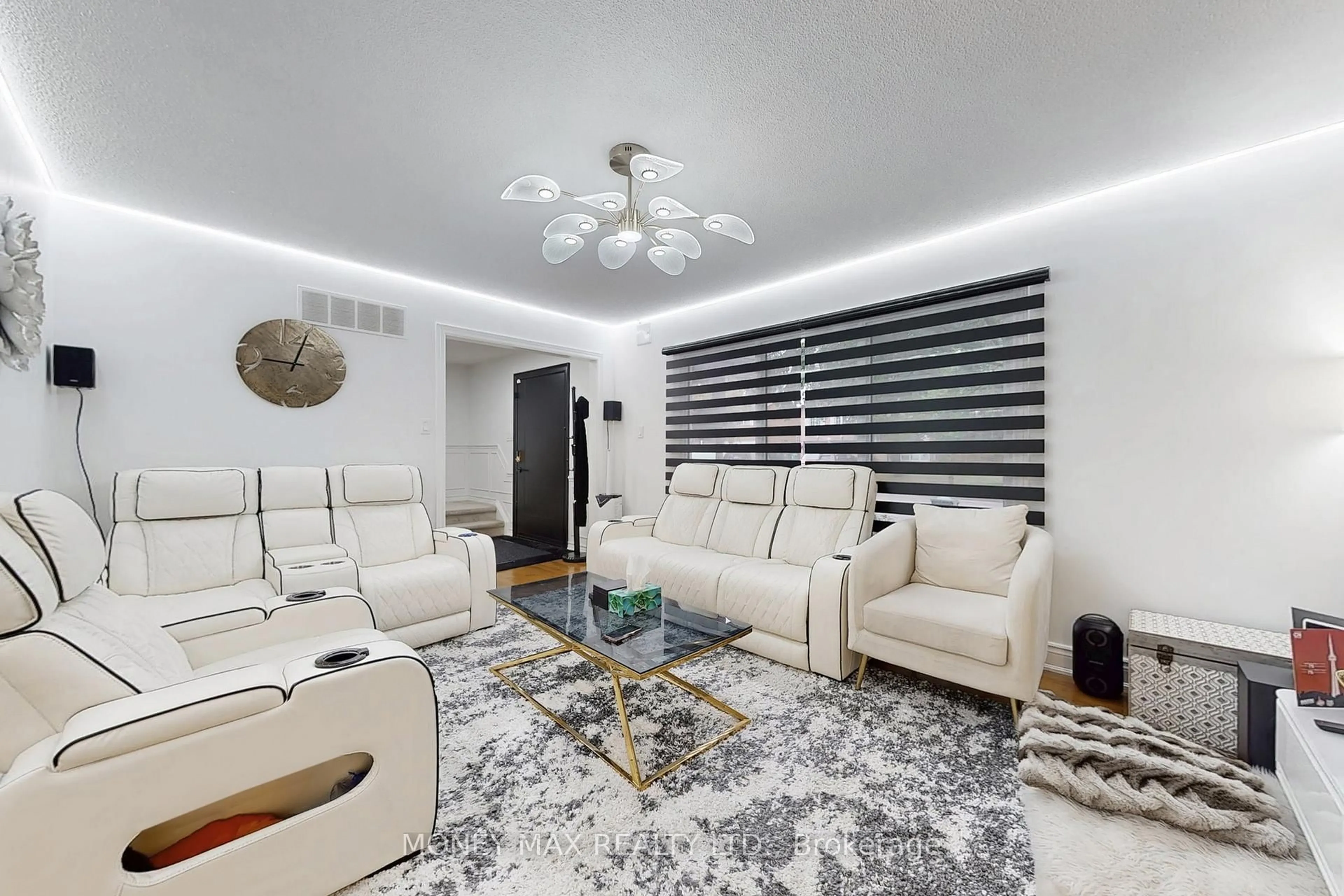 Living room with furniture, unknown for 95 Elgin Dr, Brampton Ontario L6Y 2E6