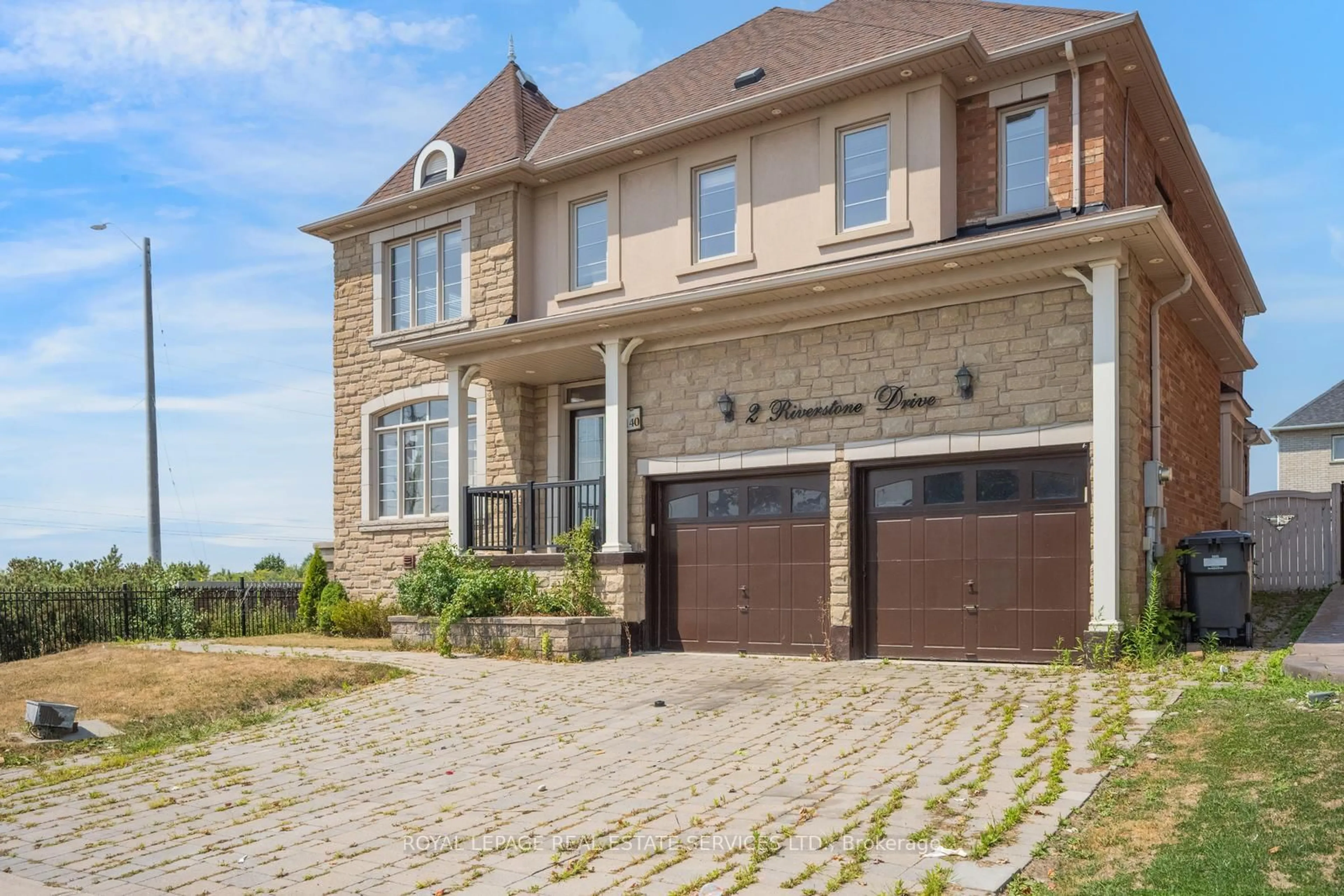Home with brick exterior material, street for 2 Riverstone Dr, Brampton Ontario L6P 2V5