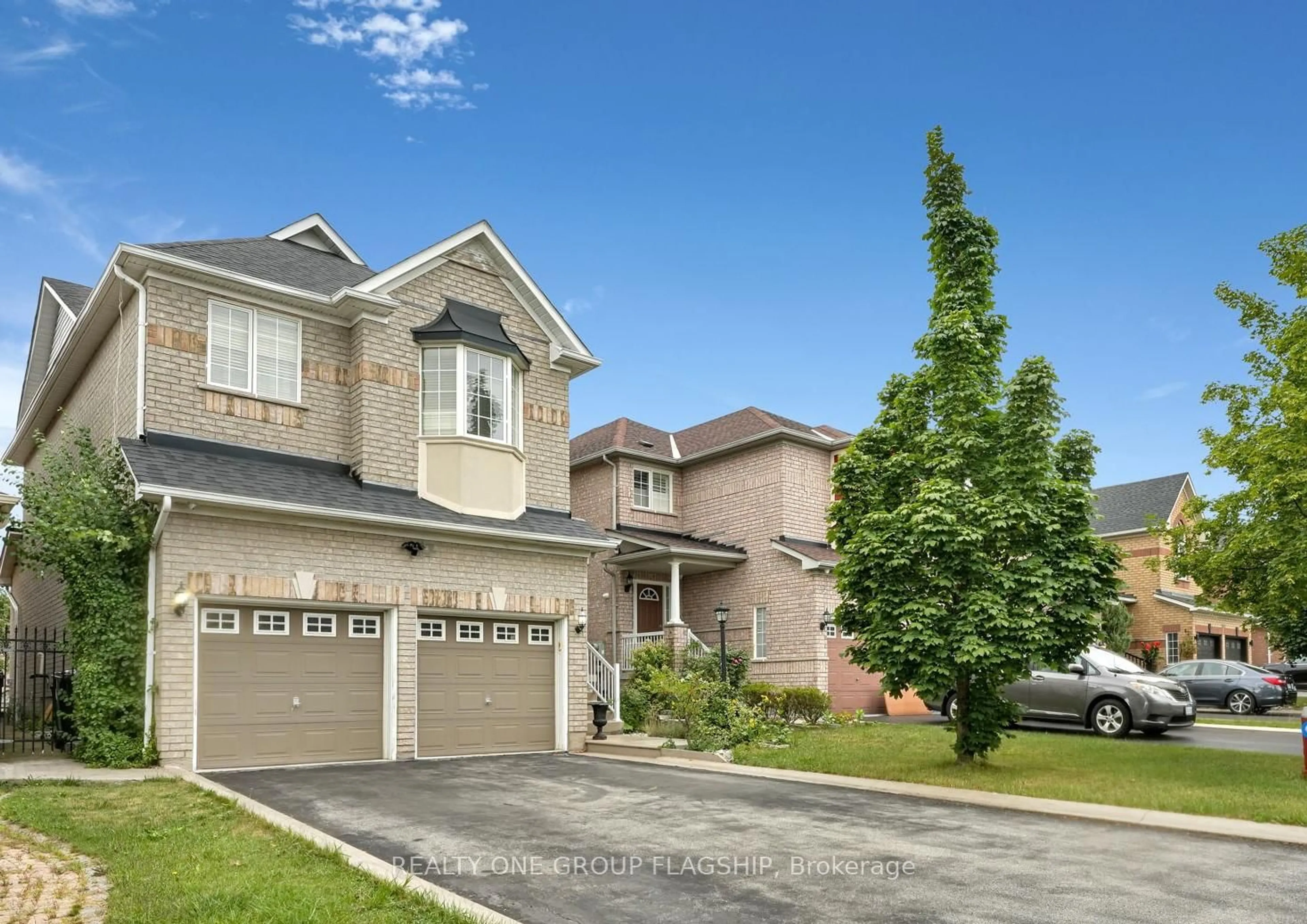 Home with brick exterior material, street for 1128 Knotty Pine Grve, Mississauga Ontario L5W 1J6