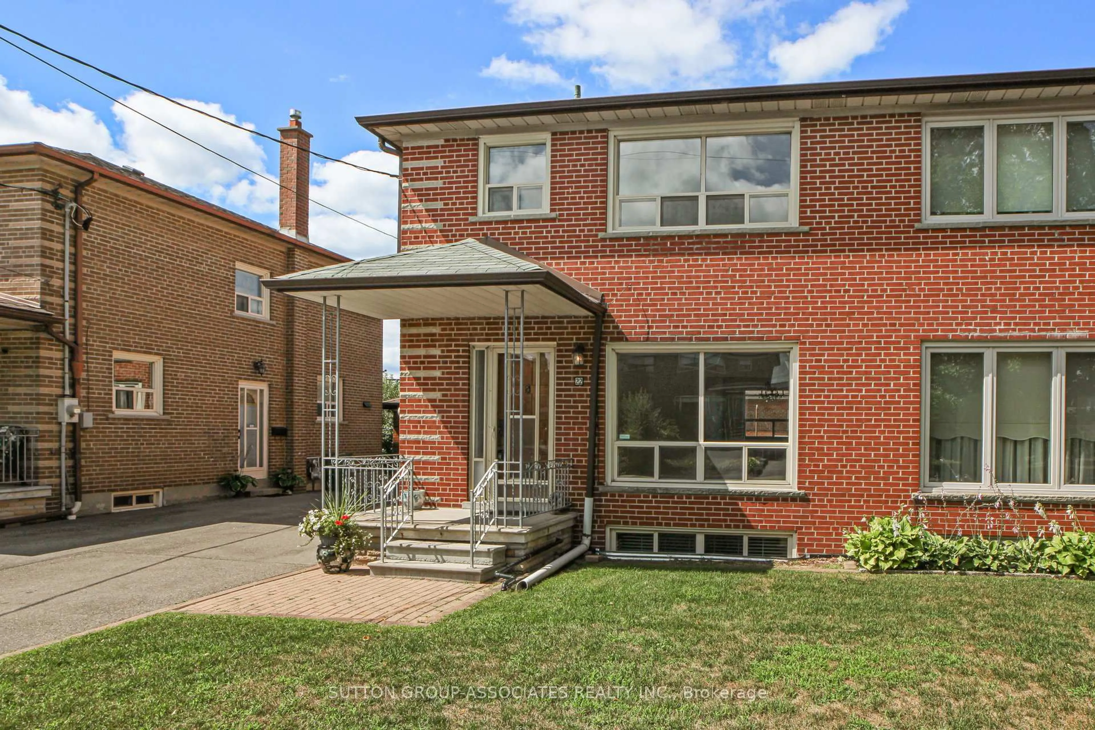 Home with brick exterior material, street for 22 Woodenhill Crt, Toronto Ontario M6M 1K9