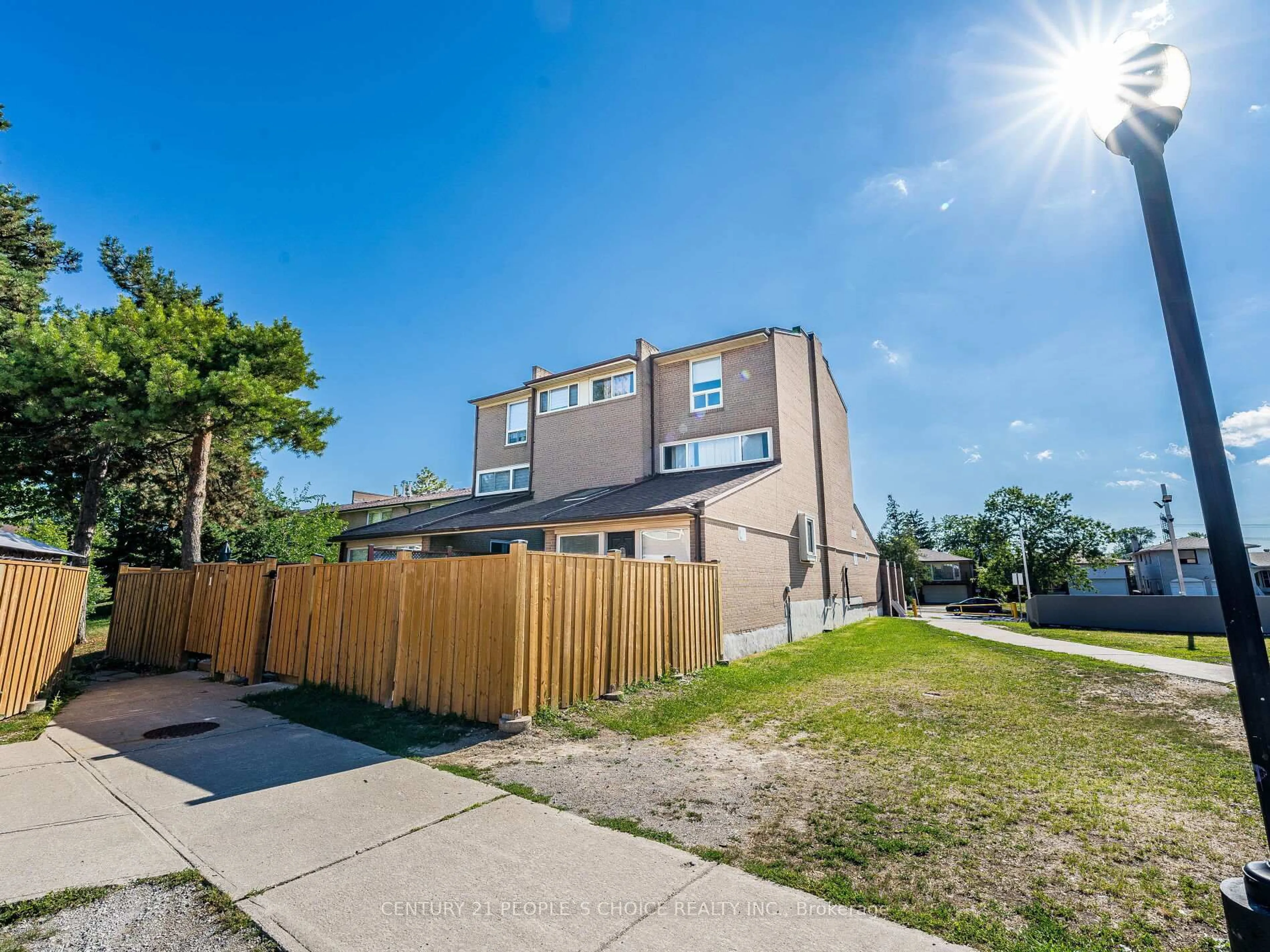 A pic from outside/outdoor area/front of a property/back of a property/a pic from drone, street for 242 John Garland Blvd #2, Toronto Ontario M9V 1N8