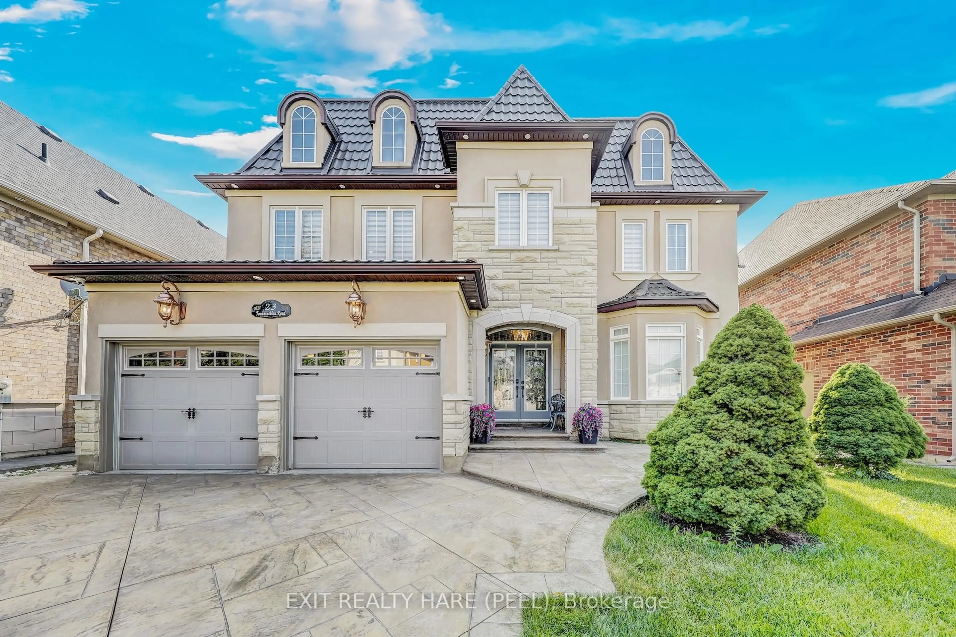 Home with brick exterior material, street for 23 Fontainebleu Rd, Brampton Ontario L6P 1Z1