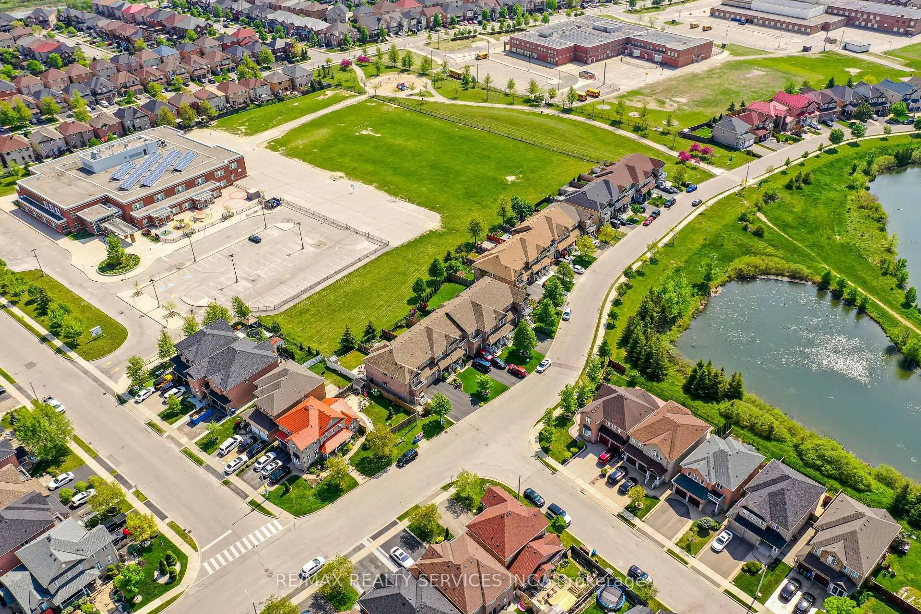 A pic from outside/outdoor area/front of a property/back of a property/a pic from drone, street for 106 Beavervalley Dr, Brampton Ontario L7A 3R3